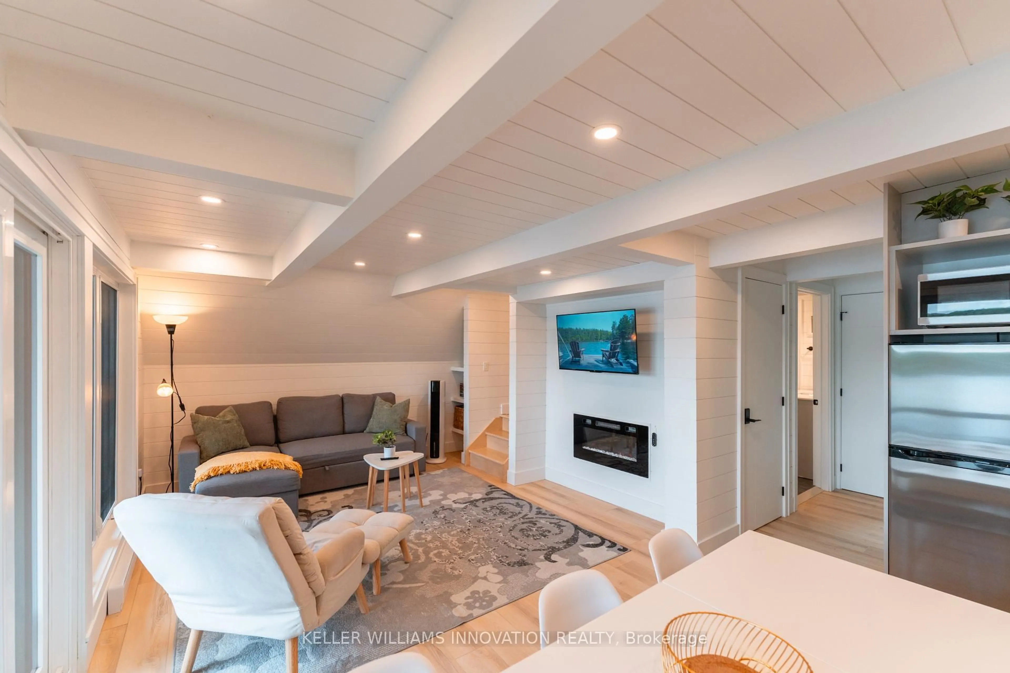 Living room with furniture, unknown for 201 N Menominee Lake Rd, Huntsville Ontario P1H 2J3