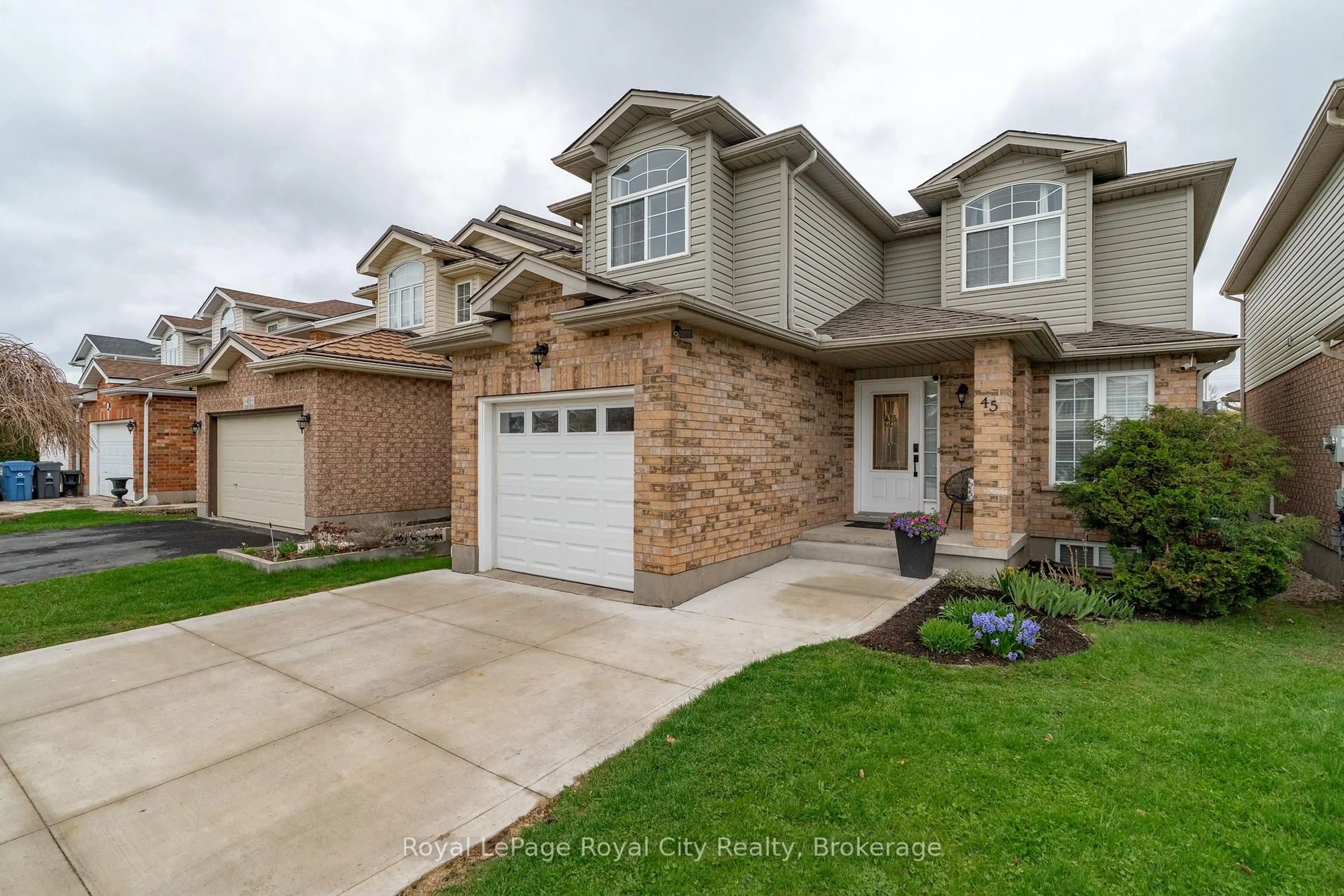 Home with brick exterior material, street for 45 Doyle Dr, Guelph Ontario N1G 5E3