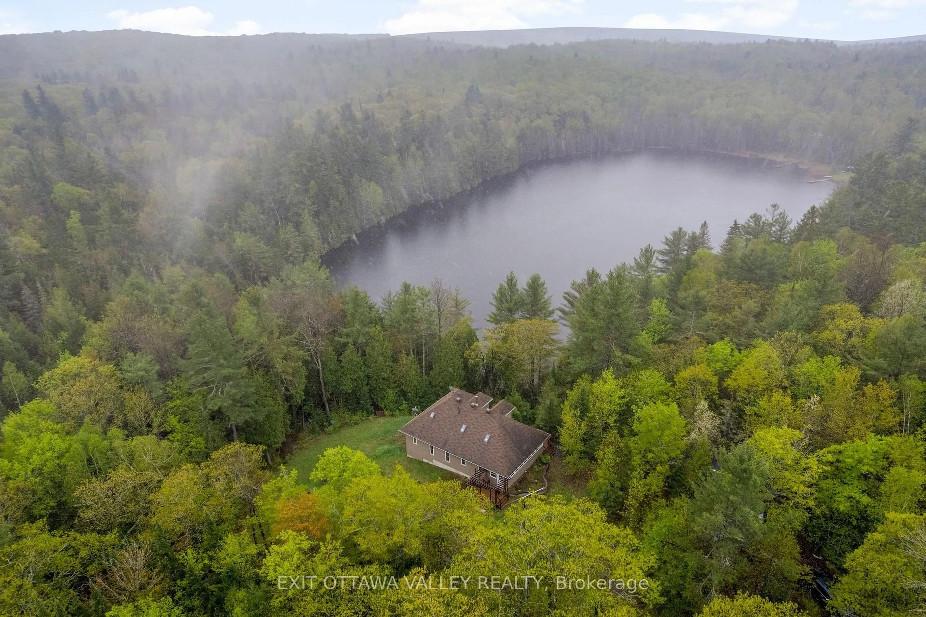 A pic from outside/outdoor area/front of a property/back of a property/a pic from drone, water/lake/river/ocean view for 28084 Highway 41, Dacre Ontario K0J 1N0
