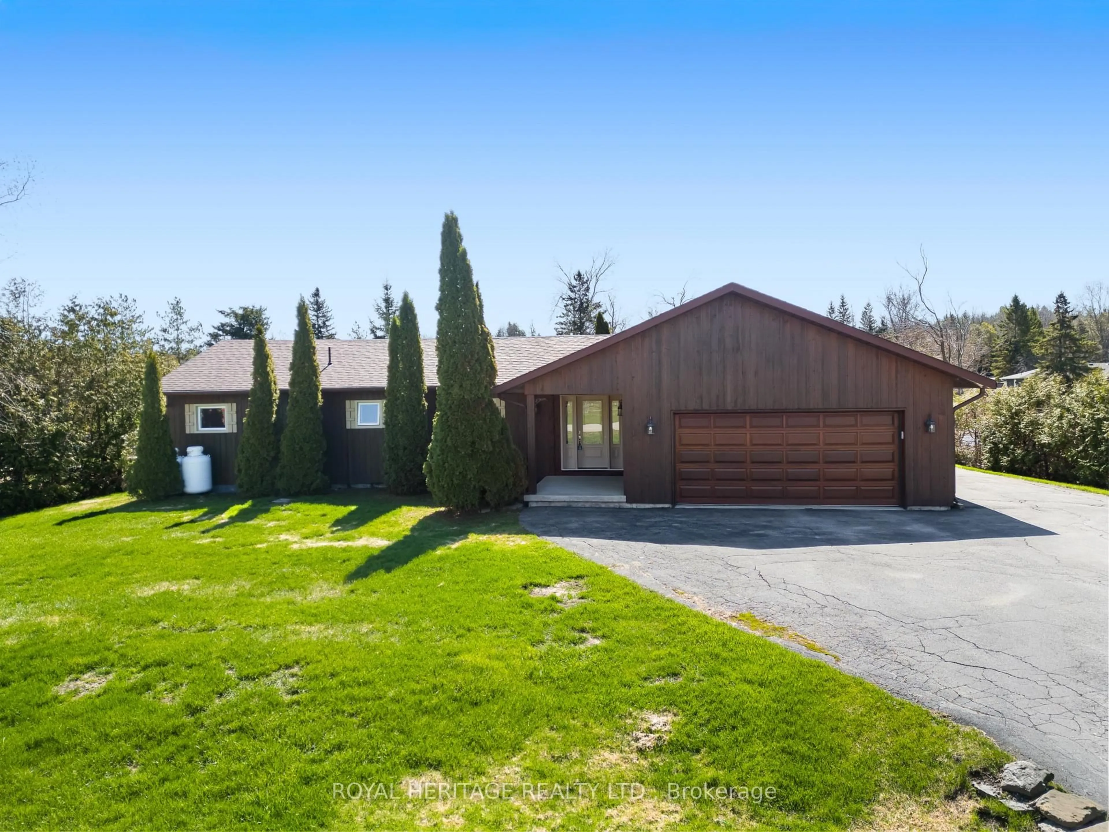 A pic from outside/outdoor area/front of a property/back of a property/a pic from drone, street for 21 Indian Tr, Kawartha Lakes Ontario K9V 4R6