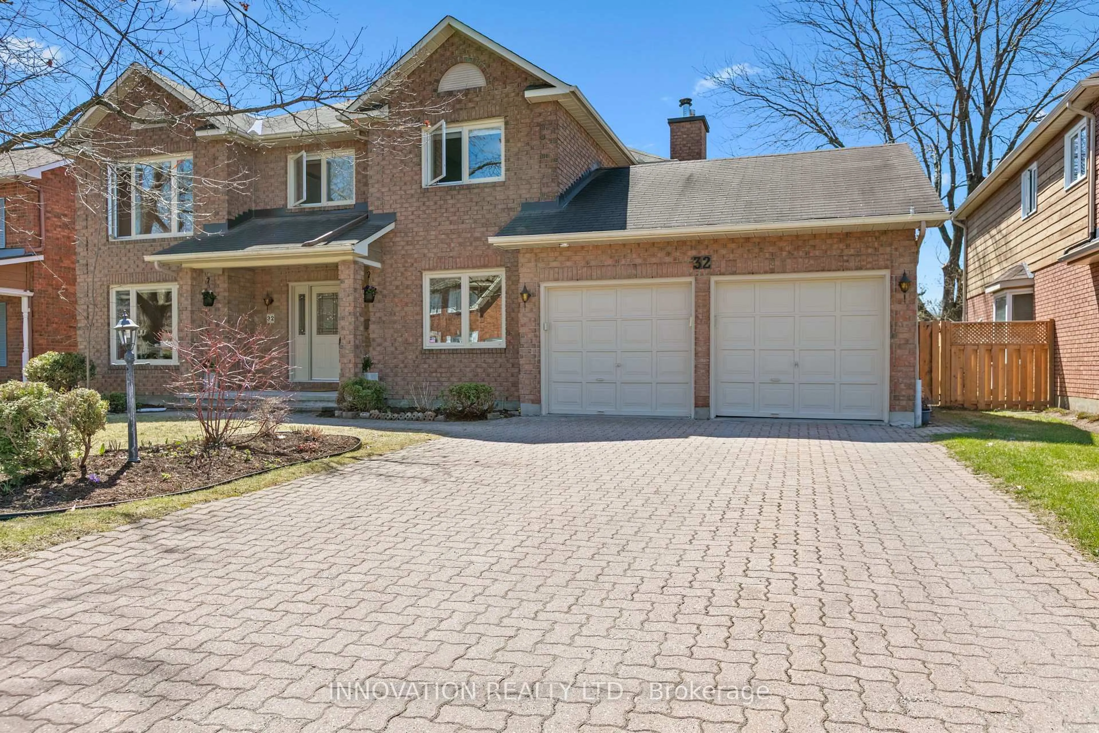 Home with brick exterior material, street for 32 Marble Arch Cres, Ottawa Ontario K2G 5S3