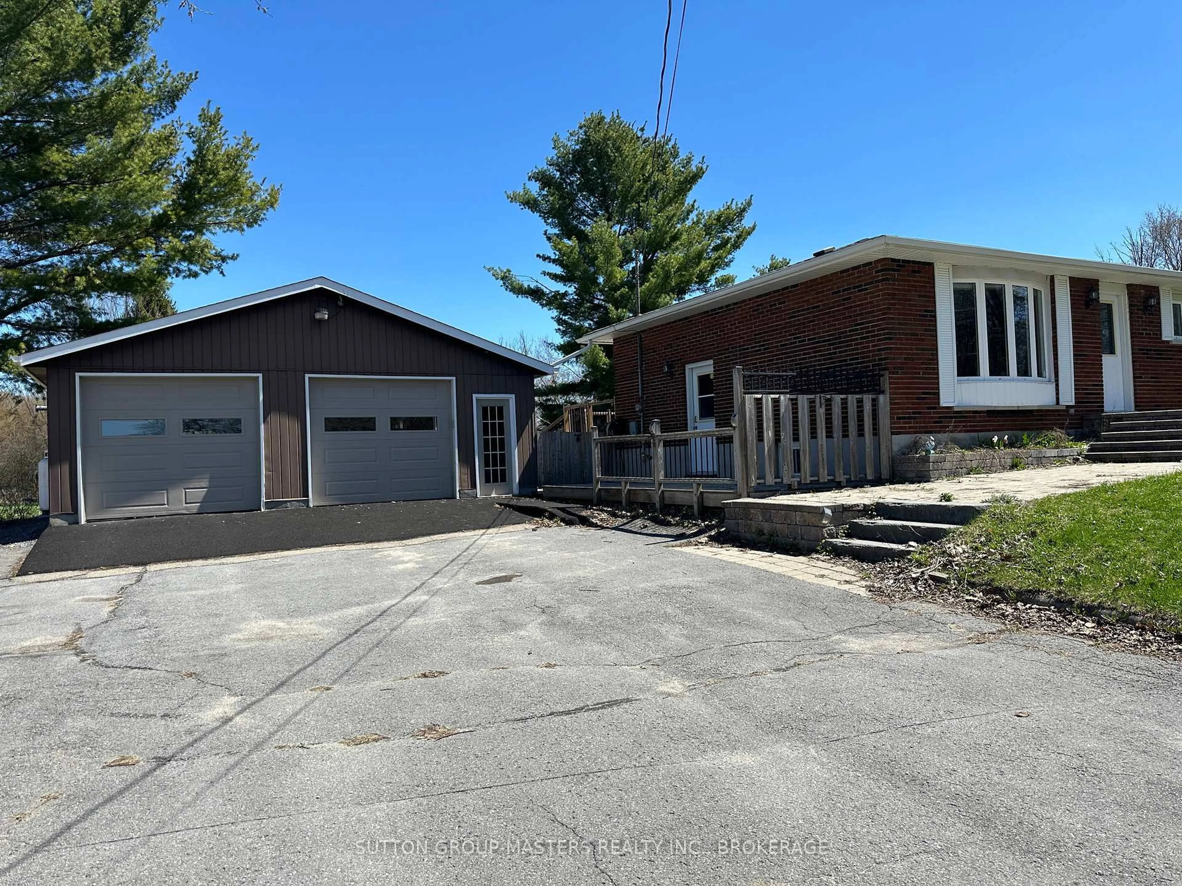 A pic from outside/outdoor area/front of a property/back of a property/a pic from drone, street for 3837 Holmes Rd, Inverary Ontario K0H 1X0