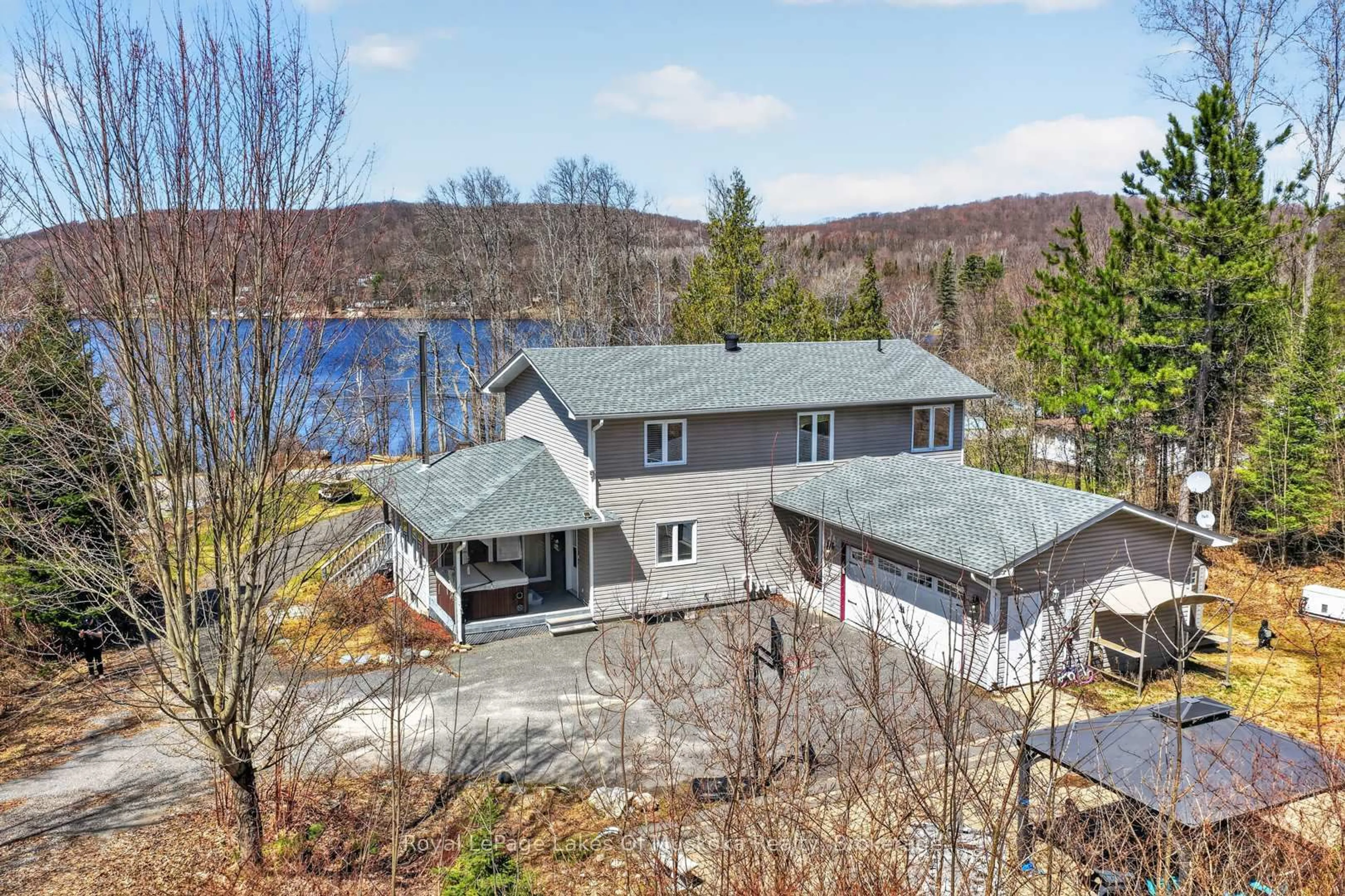 A pic from outside/outdoor area/front of a property/back of a property/a pic from drone, water/lake/river/ocean view for 283 Doe Lake Rd, Armour Ontario P0A 1L0