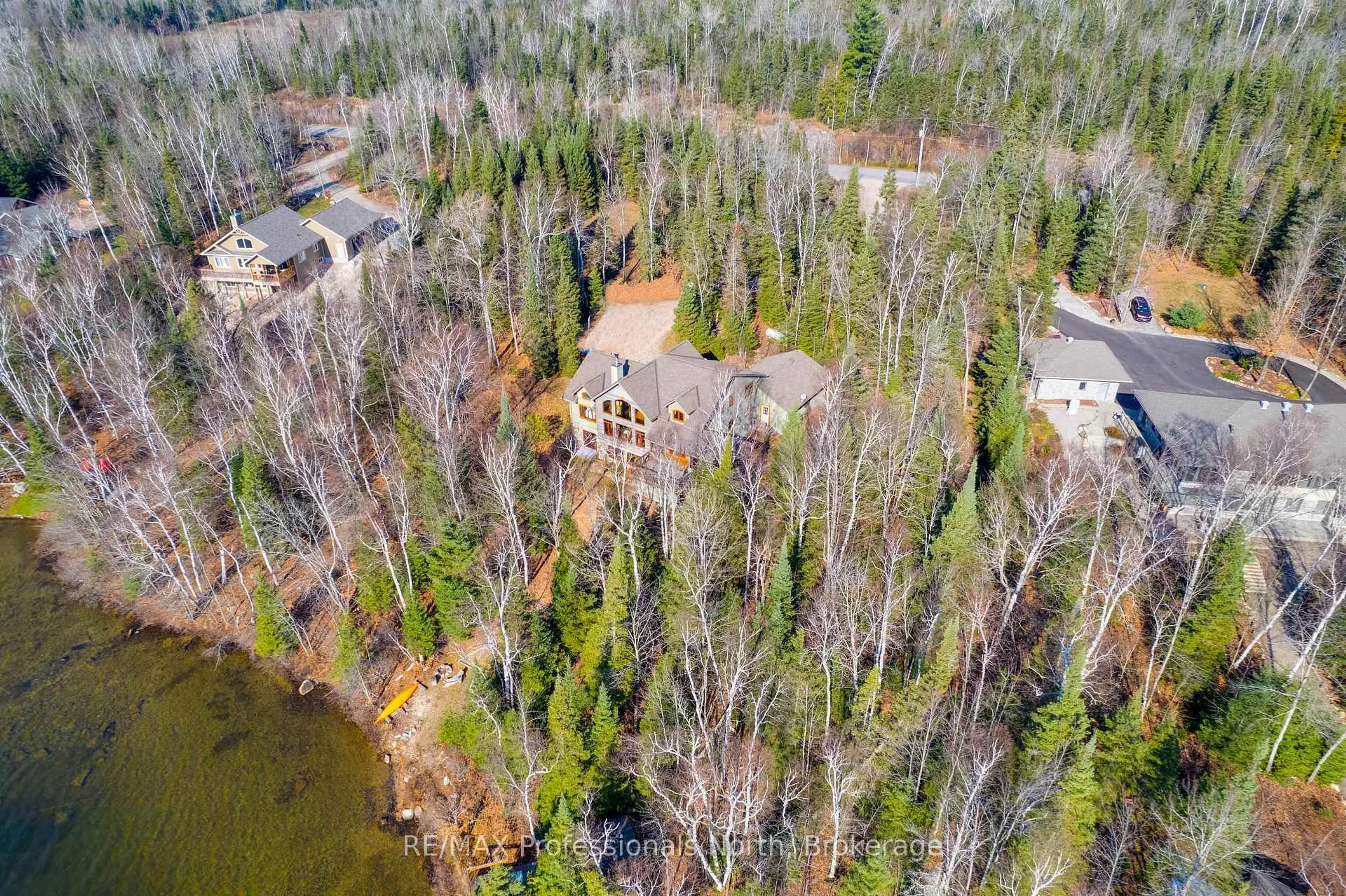 A pic from outside/outdoor area/front of a property/back of a property/a pic from drone, forest/trees view for 2625 Northshore Rd, North Bay Ontario P1B 8G4