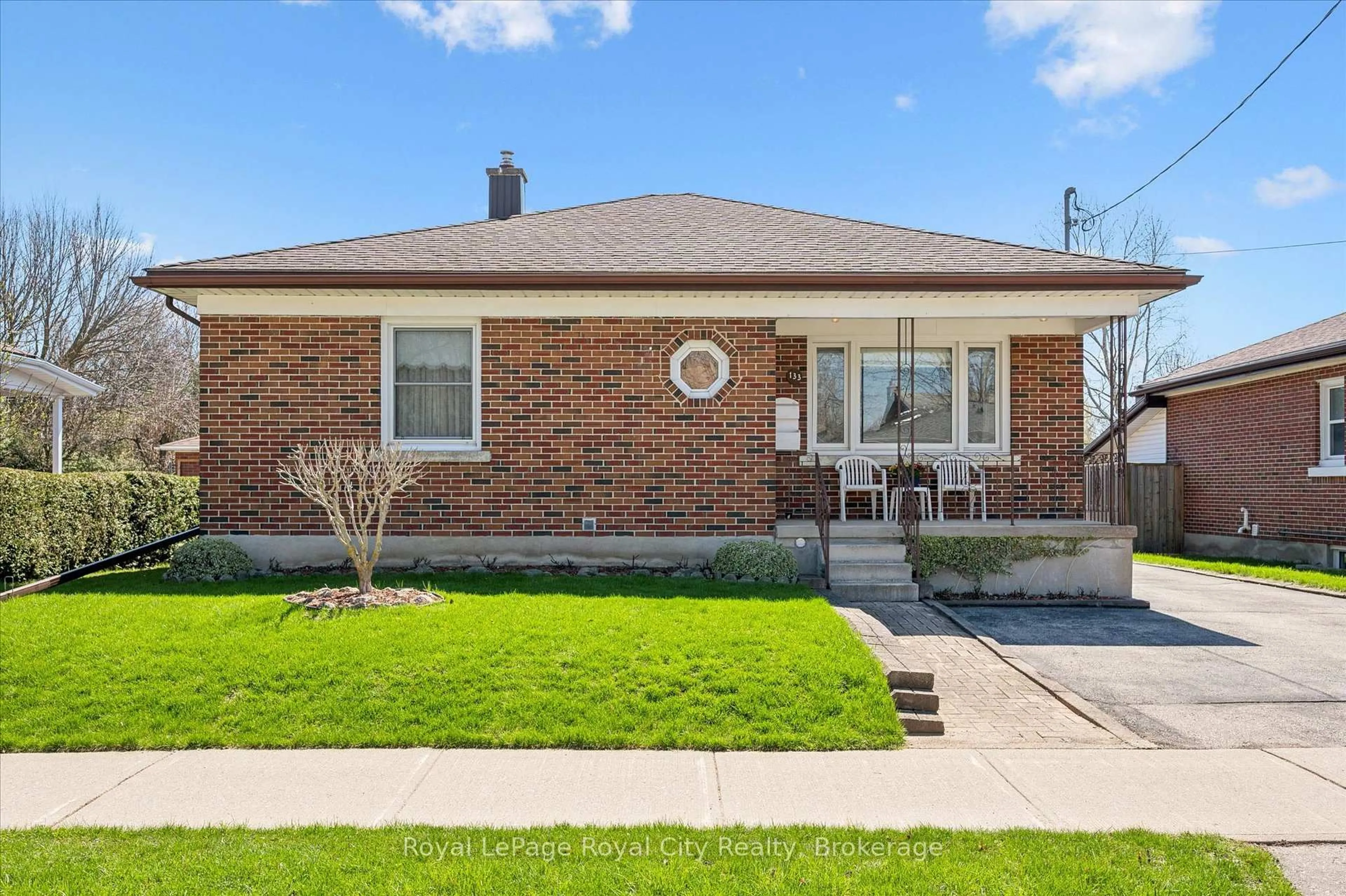 Home with brick exterior material, street for 133 Emma St, Guelph Ontario N1E 1V2