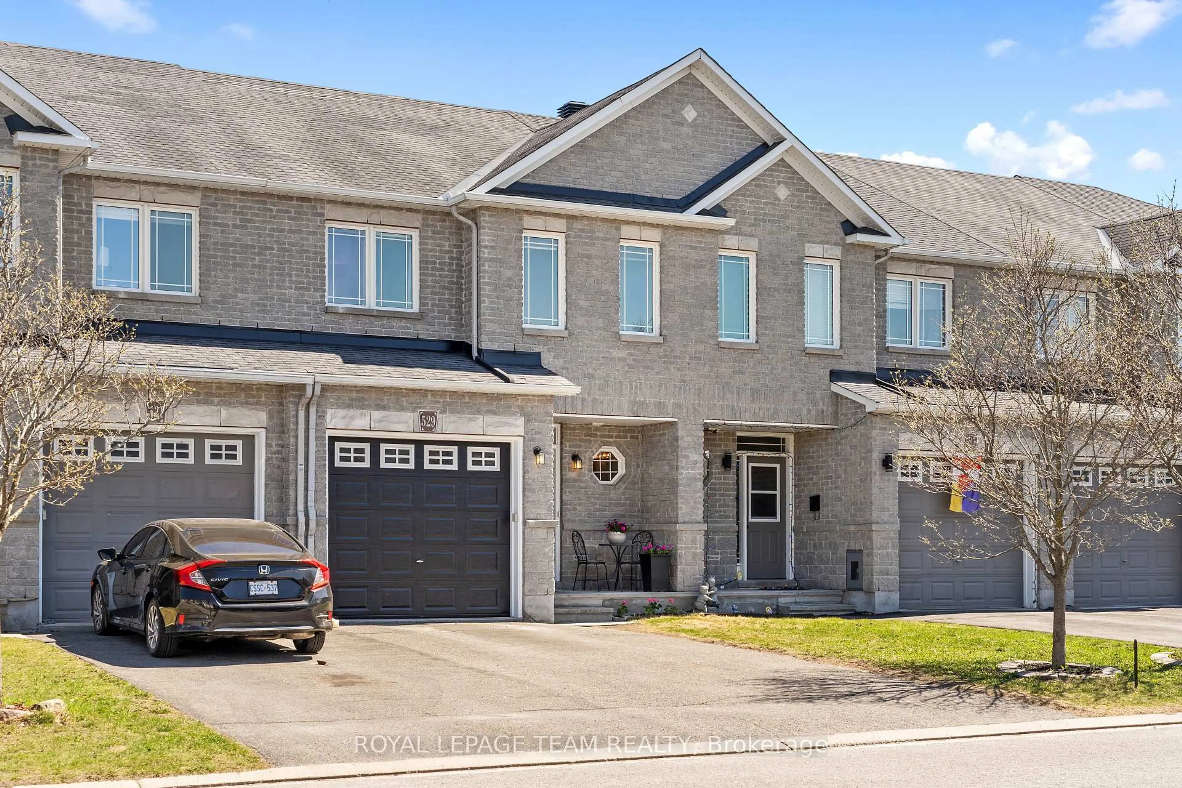Home with brick exterior material, street for 529 PEPPERVILLE Cres, Ottawa Ontario K2M 0E5