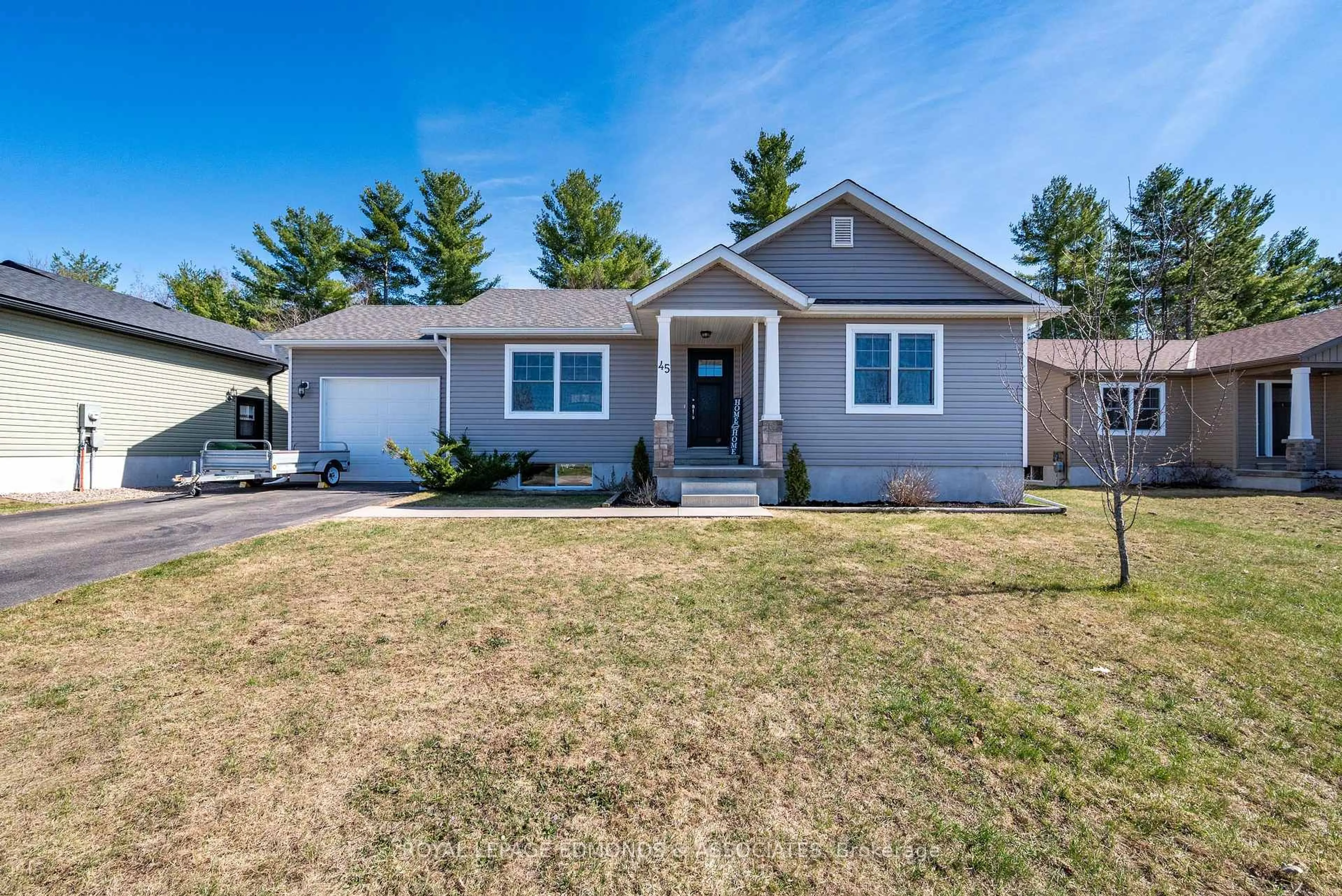 Home with vinyl exterior material, street for 45 Dustin Dr, Petawawa Ontario K8H 0G3