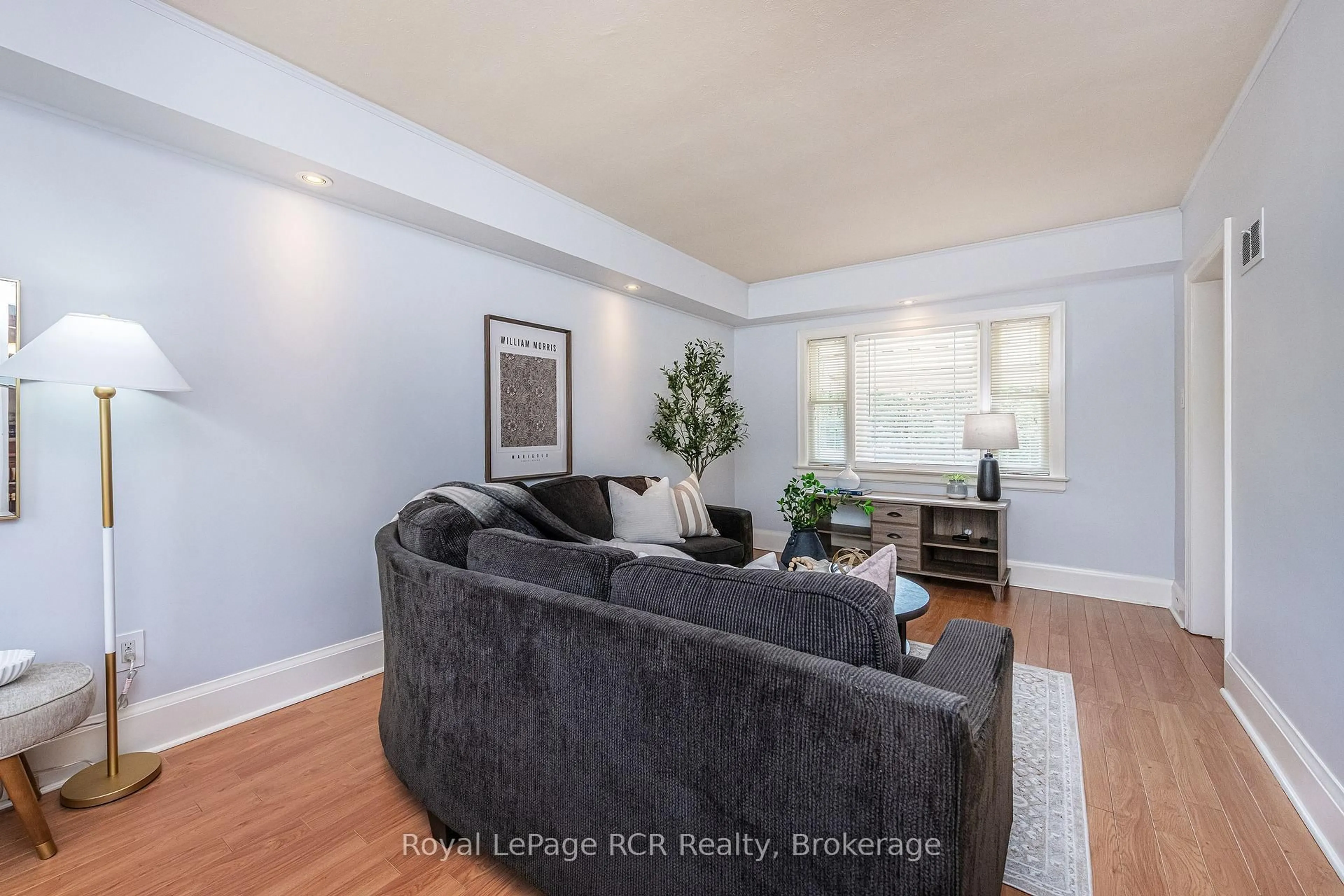 Living room with furniture, wood/laminate floor for 189 Margaret Ave, Kitchener Ontario N2H 4J1
