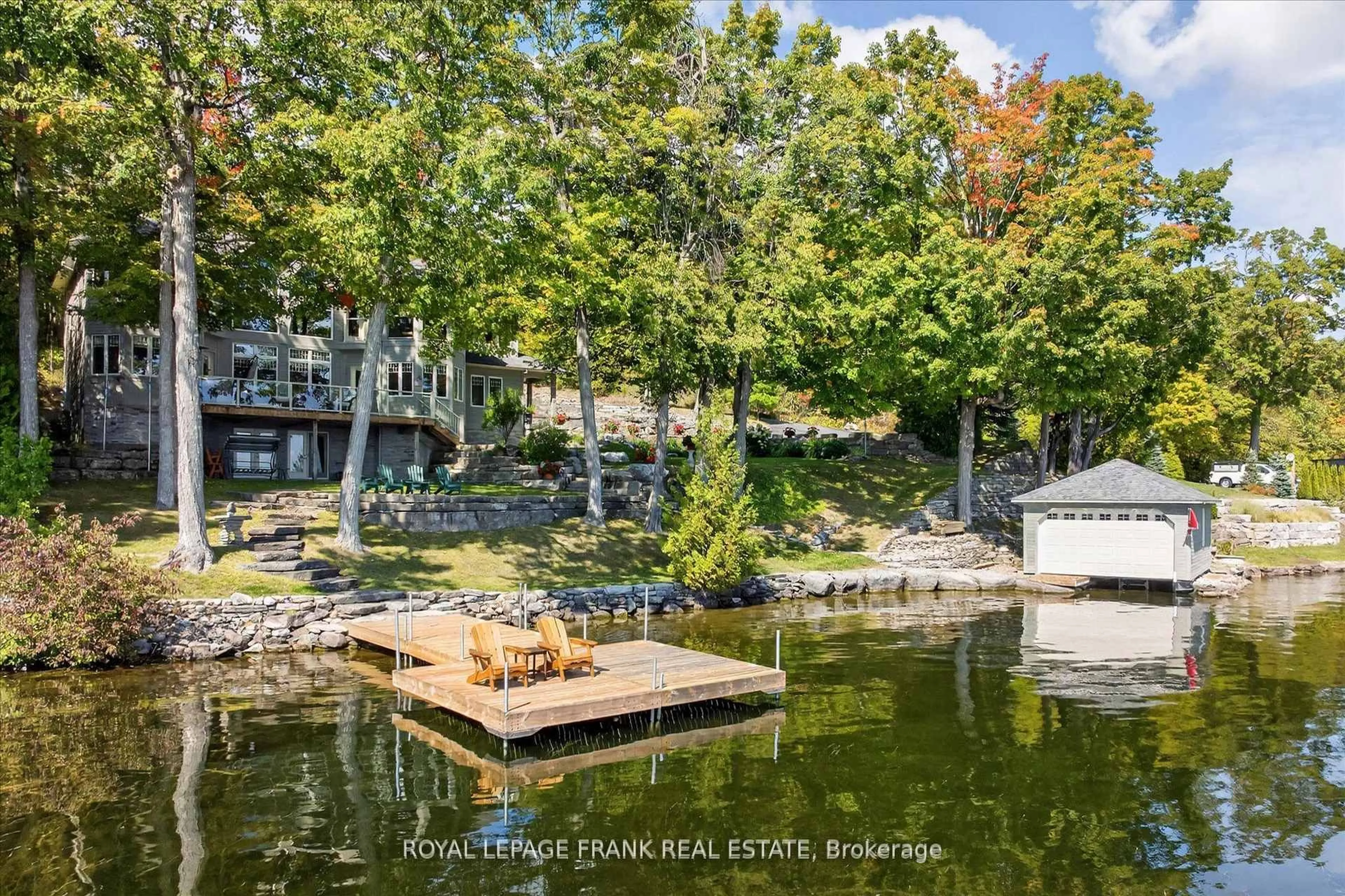 A pic from outside/outdoor area/front of a property/back of a property/a pic from drone, water/lake/river/ocean view for 3081 Beachwood Dr, Selwyn Ontario K0L 2H0