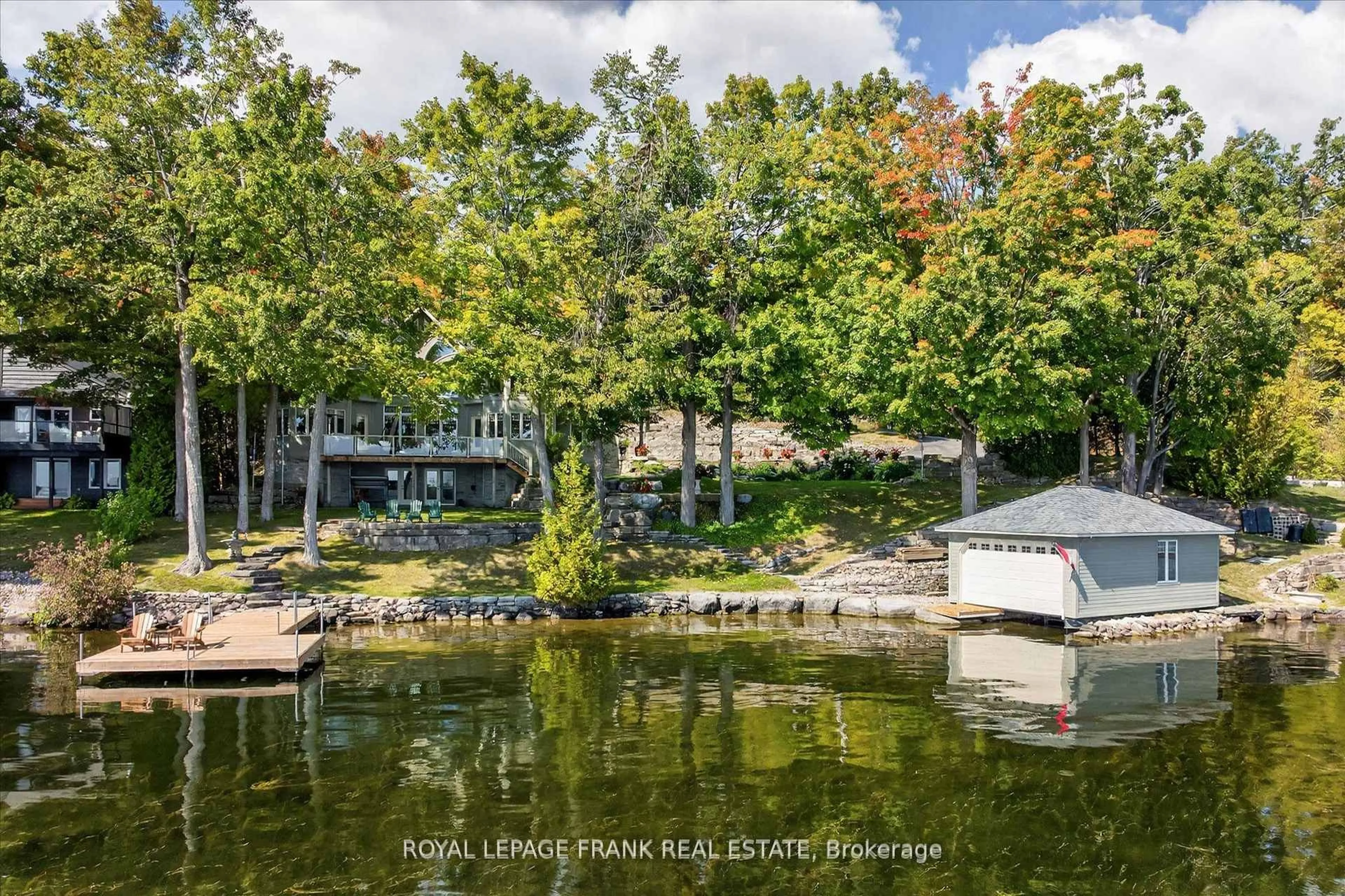 A pic from outside/outdoor area/front of a property/back of a property/a pic from drone, water/lake/river/ocean view for 3081 Beachwood Dr, Selwyn Ontario K0L 2H0