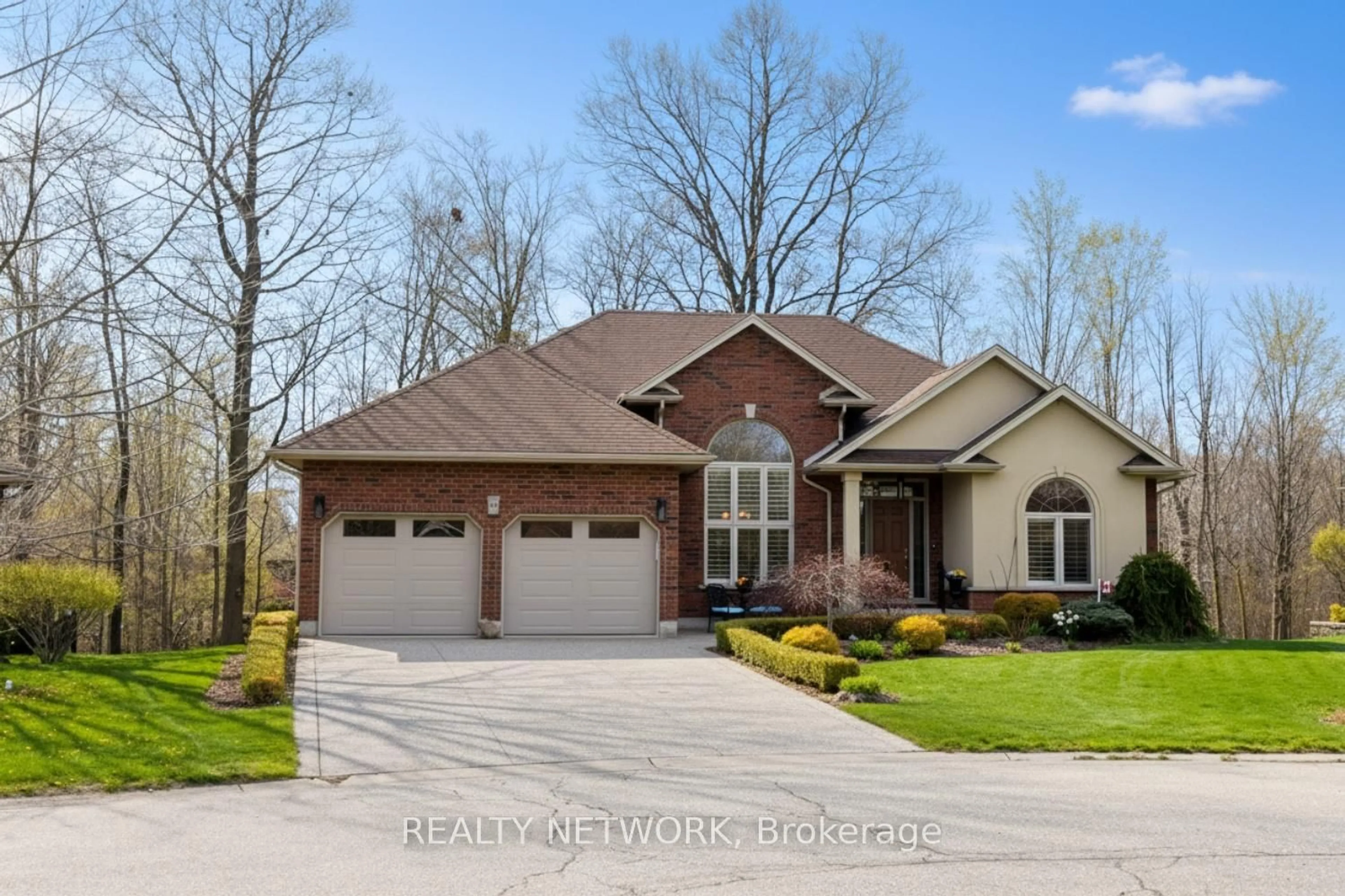 Home with brick exterior material, street for 34 Birch Ave, Norfolk Ontario N0A 1N6