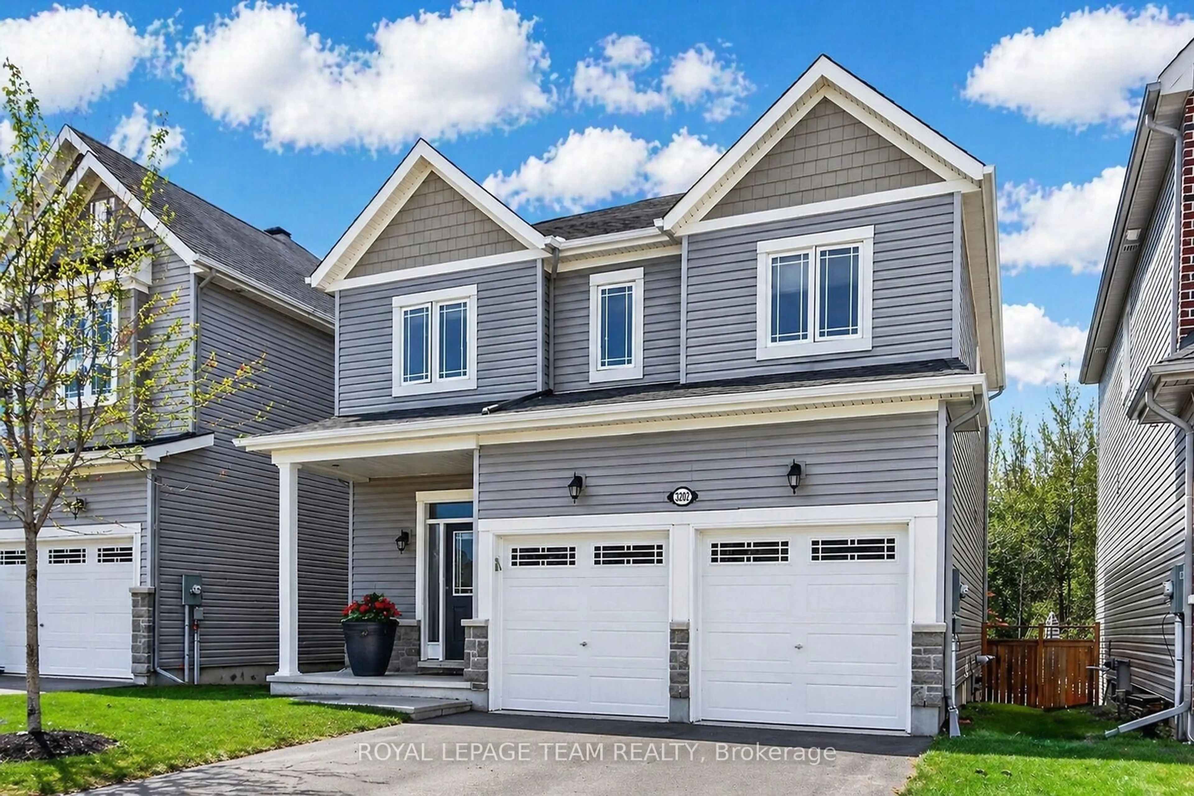 Home with vinyl exterior material, street for 3202 Harvester Cres, North Grenville Ontario K0G 1J0