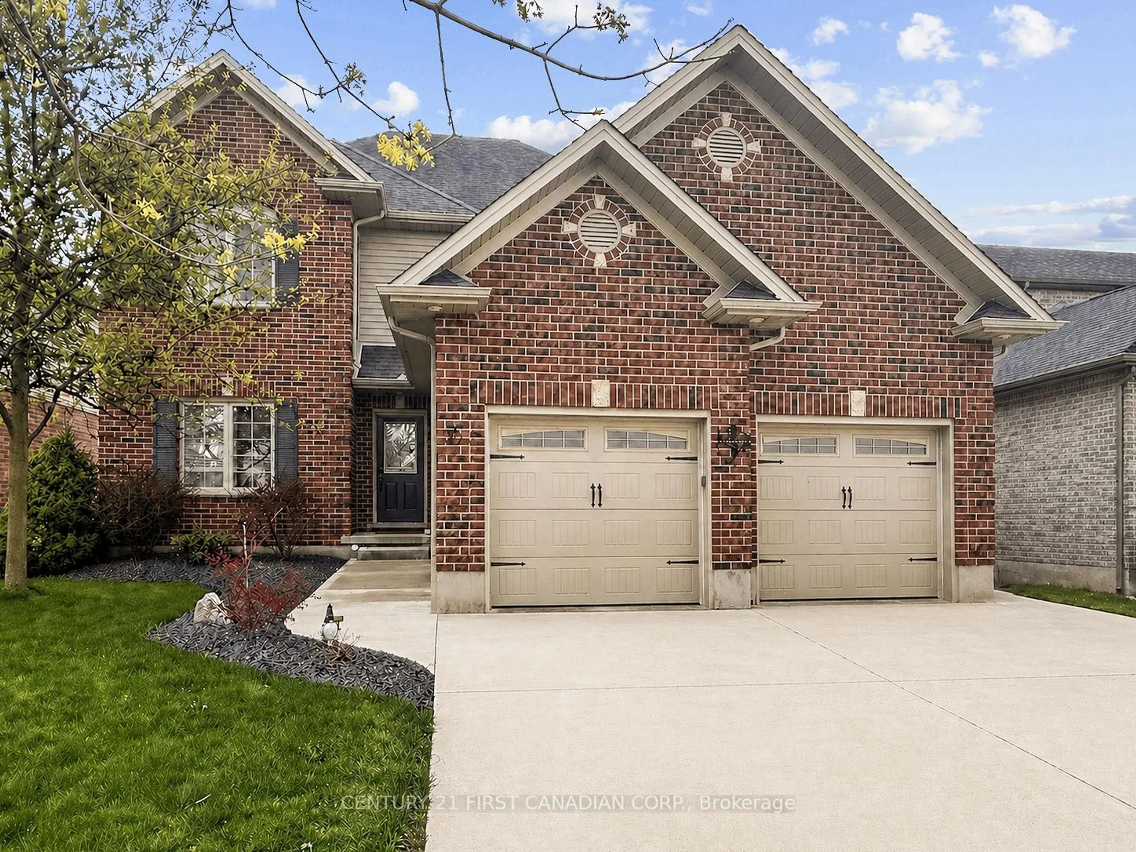Home with brick exterior material, street for 35 Wood Lily Lane, Middlesex Centre Ontario N0M 2A0