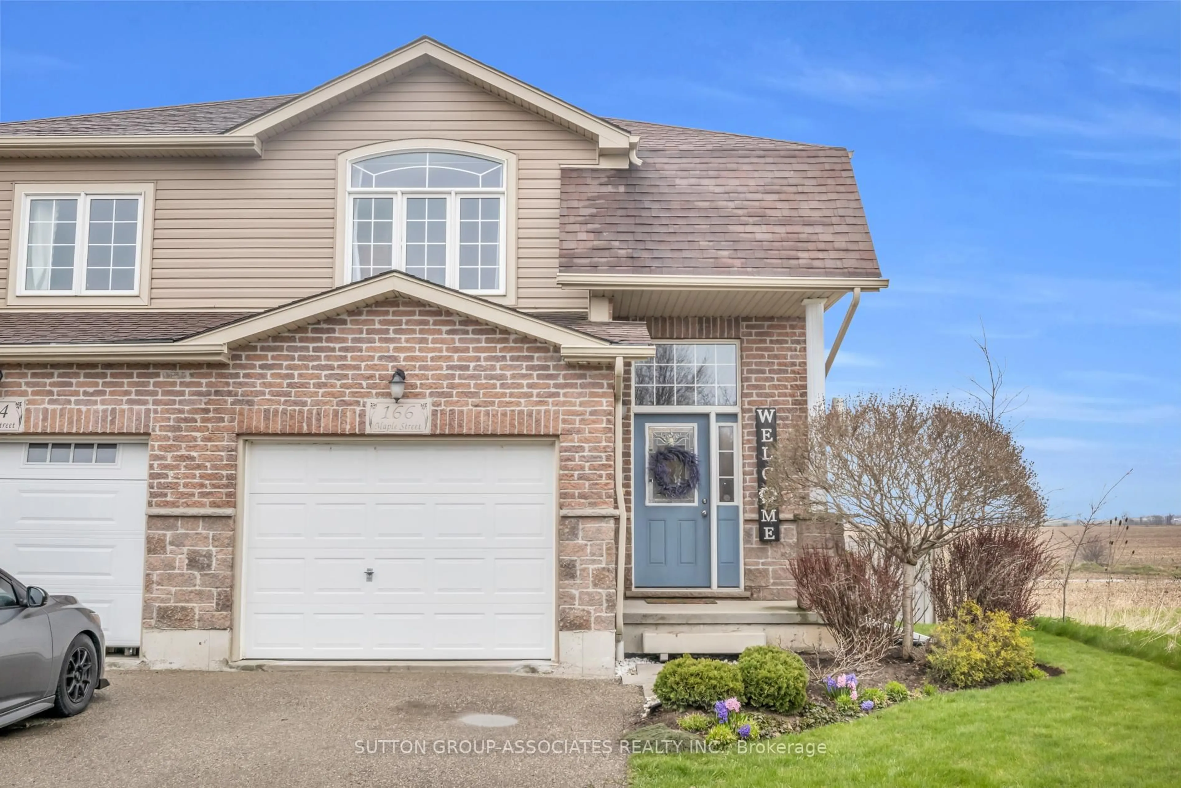 Home with brick exterior material, street for 166 Maple St, Mapleton Ontario N0G 1P0