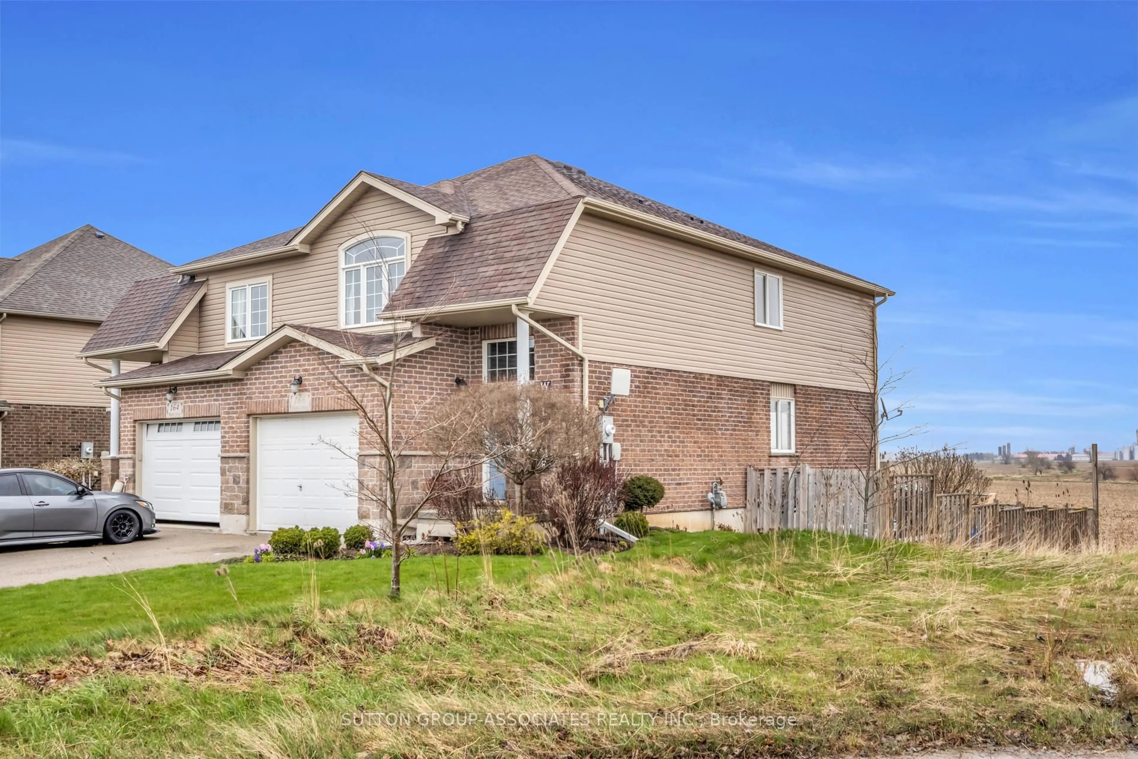 Home with brick exterior material, street for 166 Maple St, Mapleton Ontario N0G 1P0