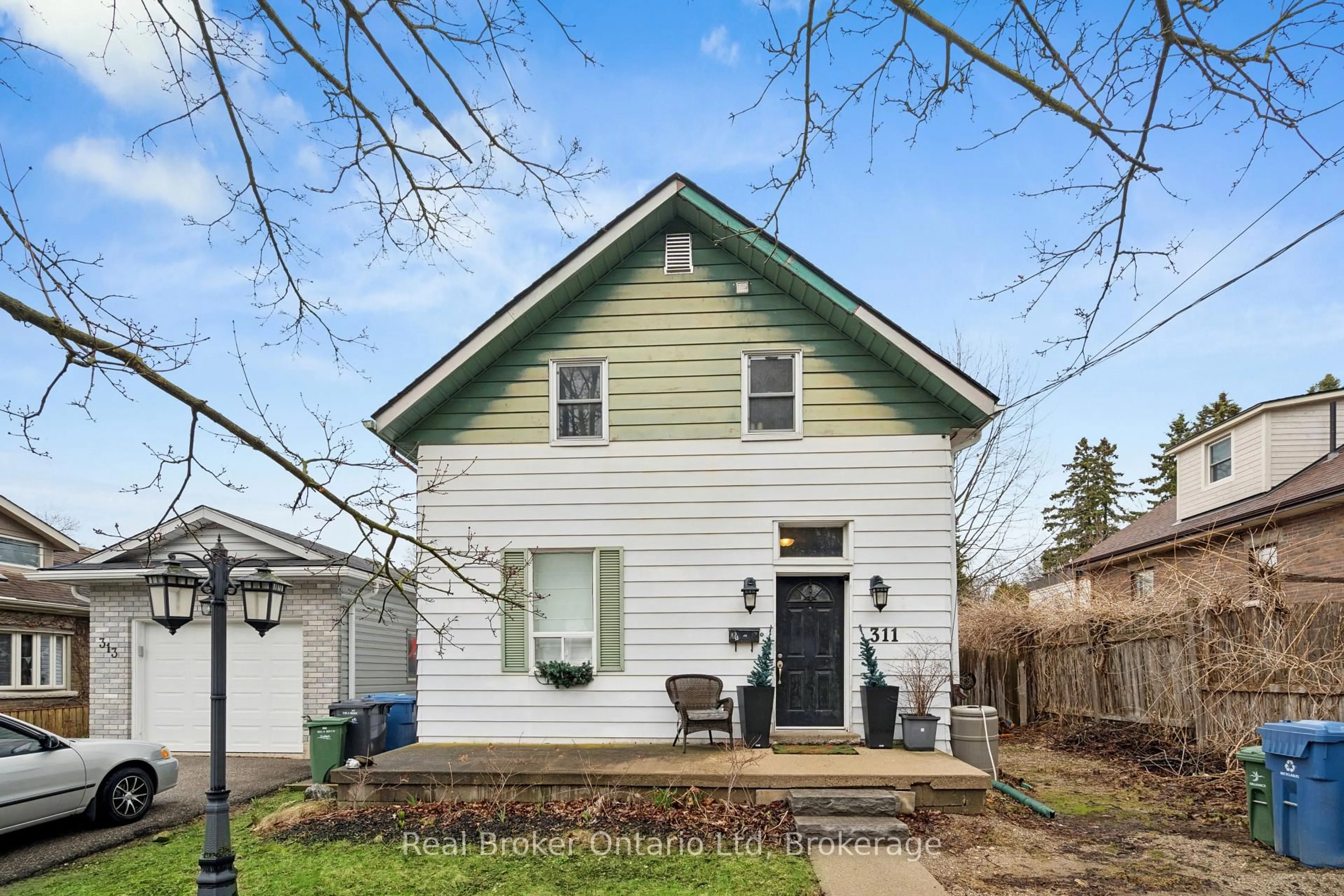 Home with vinyl exterior material, street for 311 suffolk St, Guelph Ontario N1K 2K2