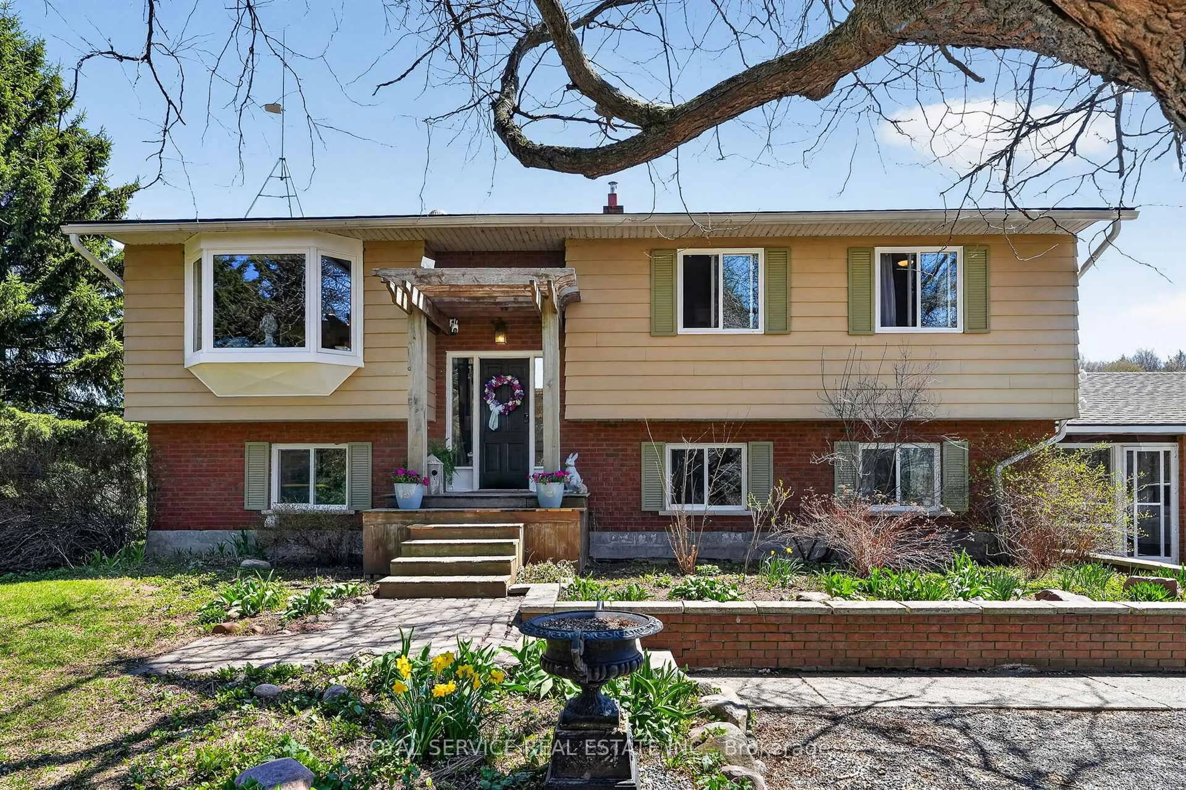 Home with brick exterior material, street for 2021 County  3 Rd, Prince Edward County Ontario K0K 1L0