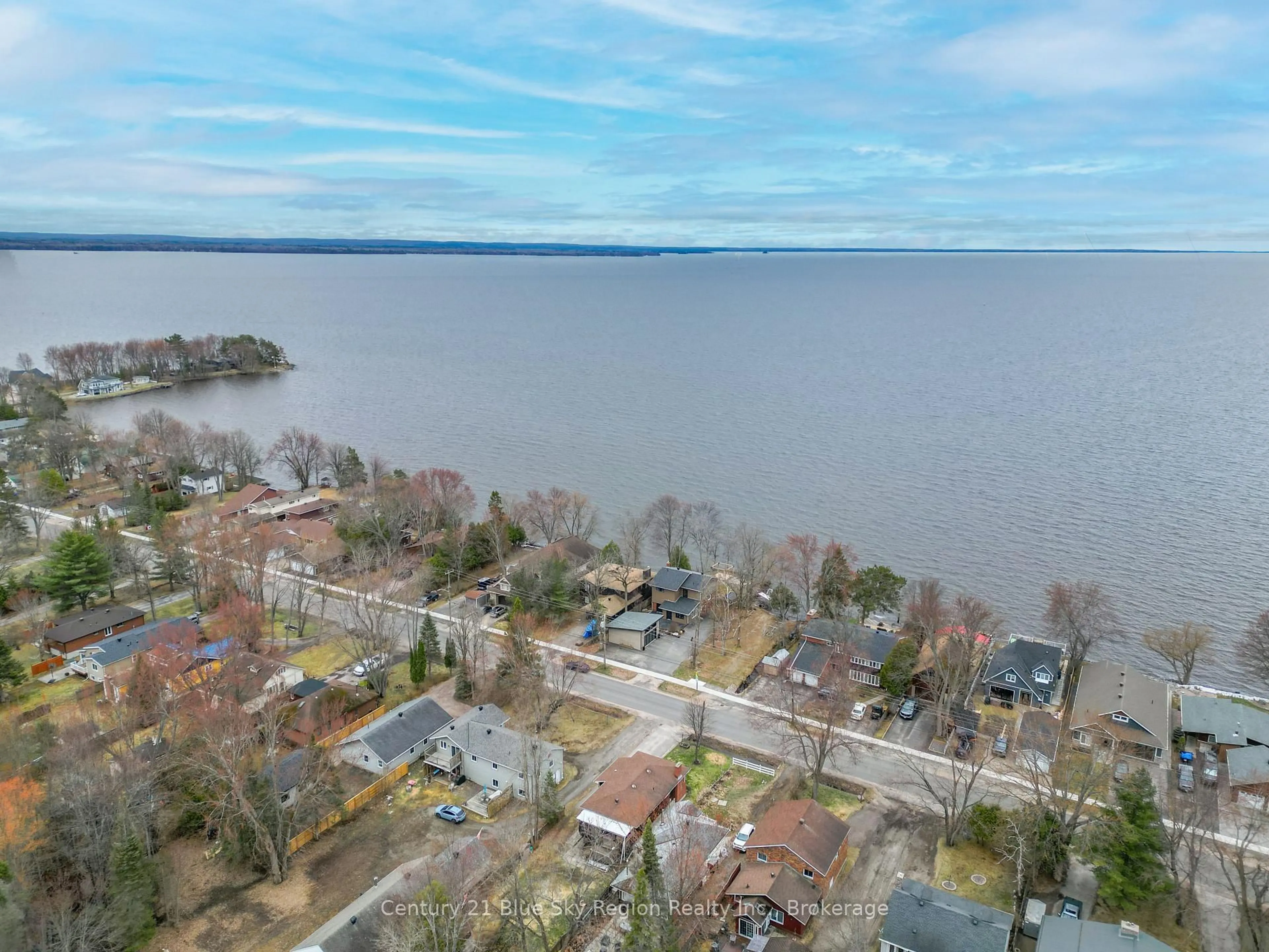 A pic from outside/outdoor area/front of a property/back of a property/a pic from drone, water/lake/river/ocean view for 1064 Premier Rd, North Bay Ontario P1A 2J1
