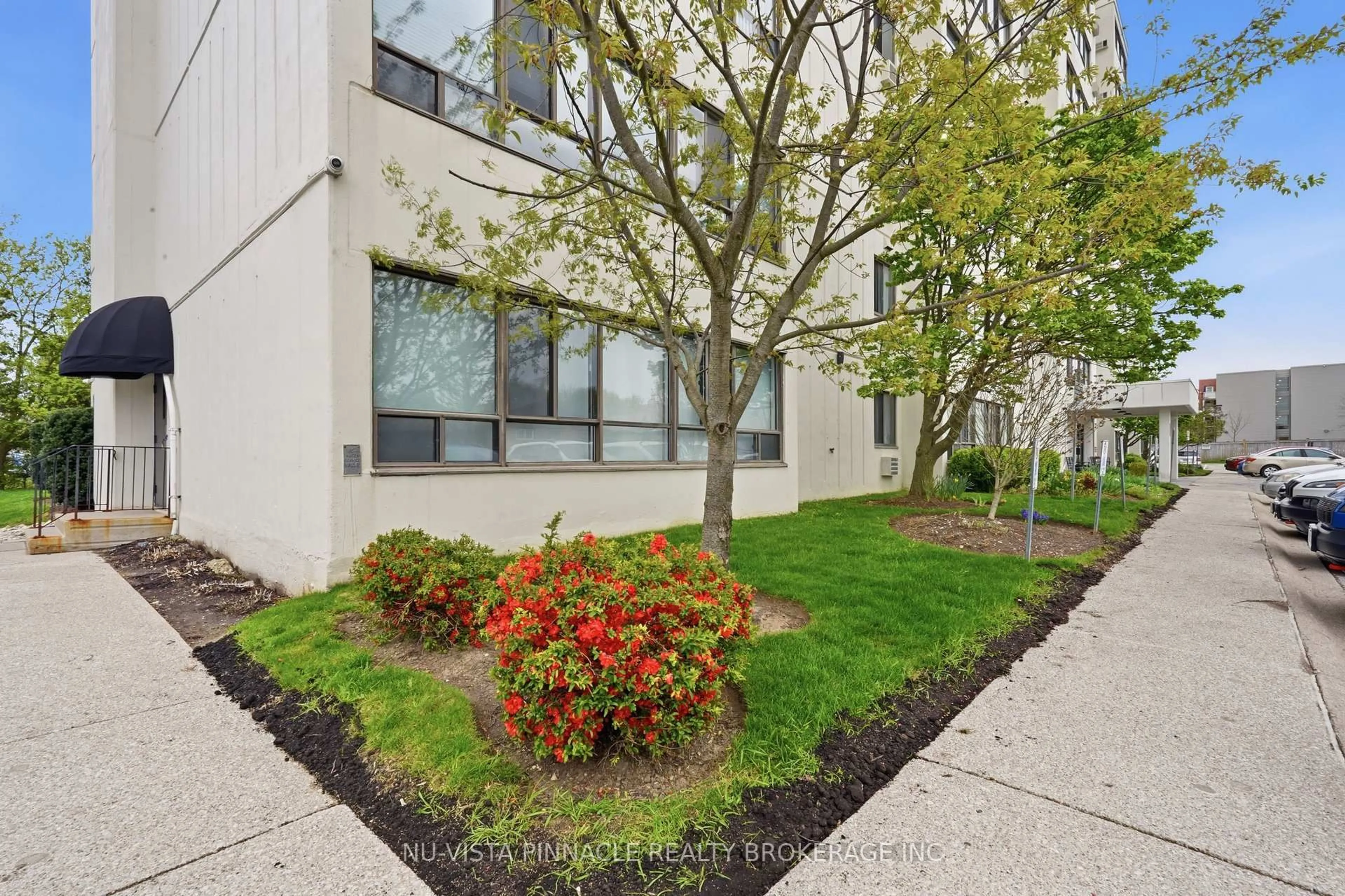 Patio, street for 135 Baseline Rd #104, London South Ontario N6J 4W4