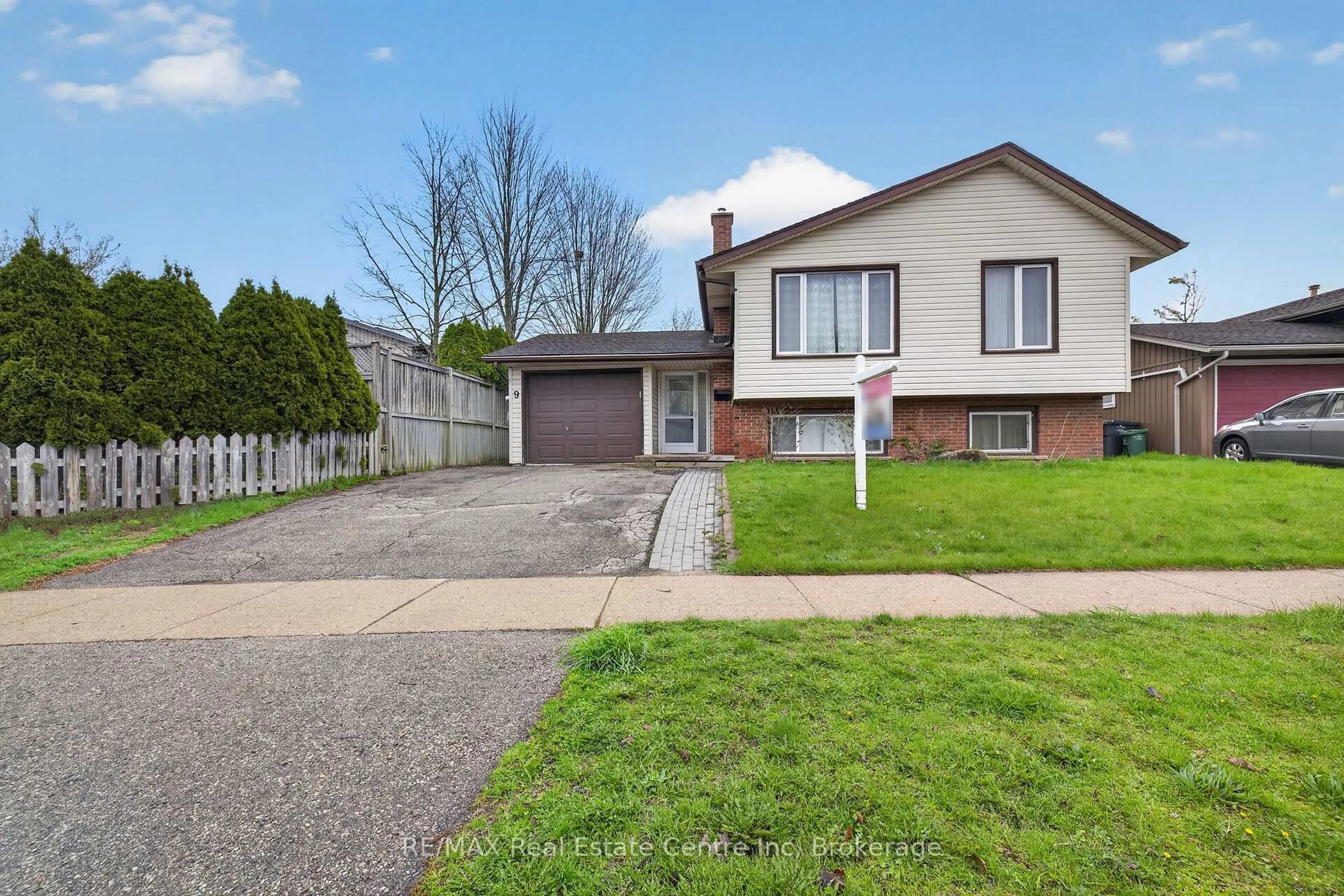 Home with brick exterior material, street for 9 Sanderson Dr, Guelph Ontario N1H 6T7