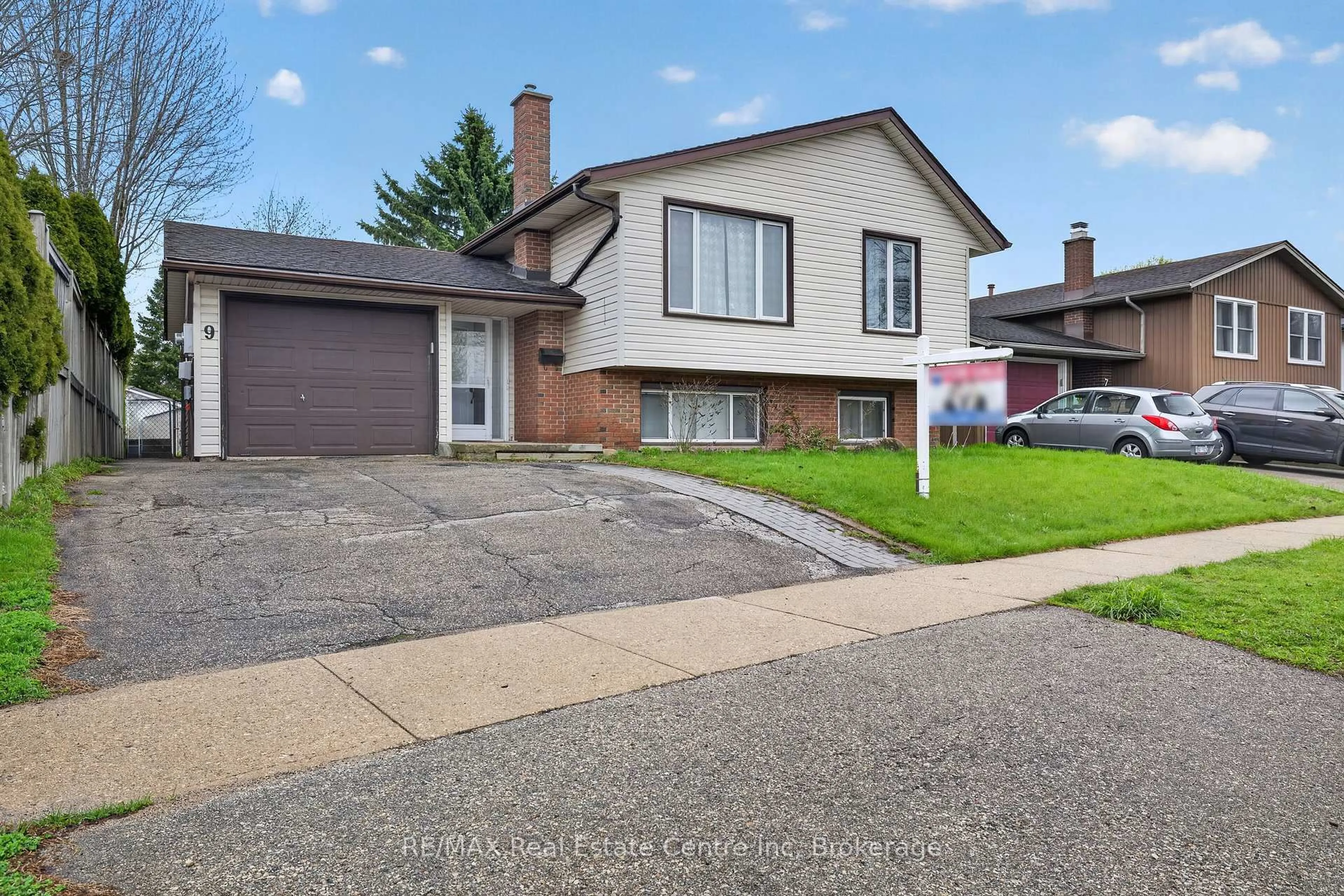 Home with vinyl exterior material, street for 9 Sanderson Dr, Guelph Ontario N1H 6T7