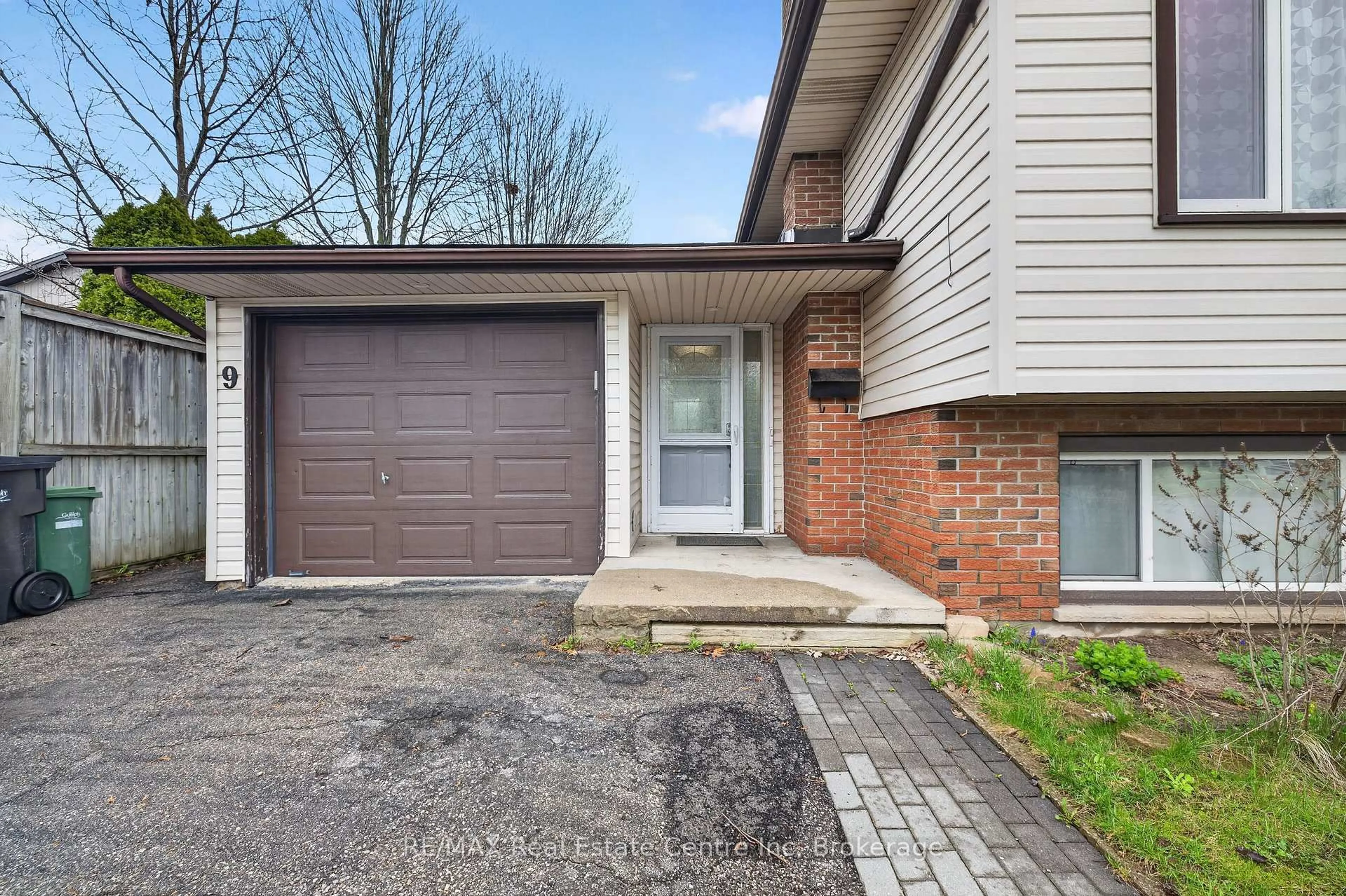 Home with brick exterior material, street for 9 Sanderson Dr, Guelph Ontario N1H 6T7