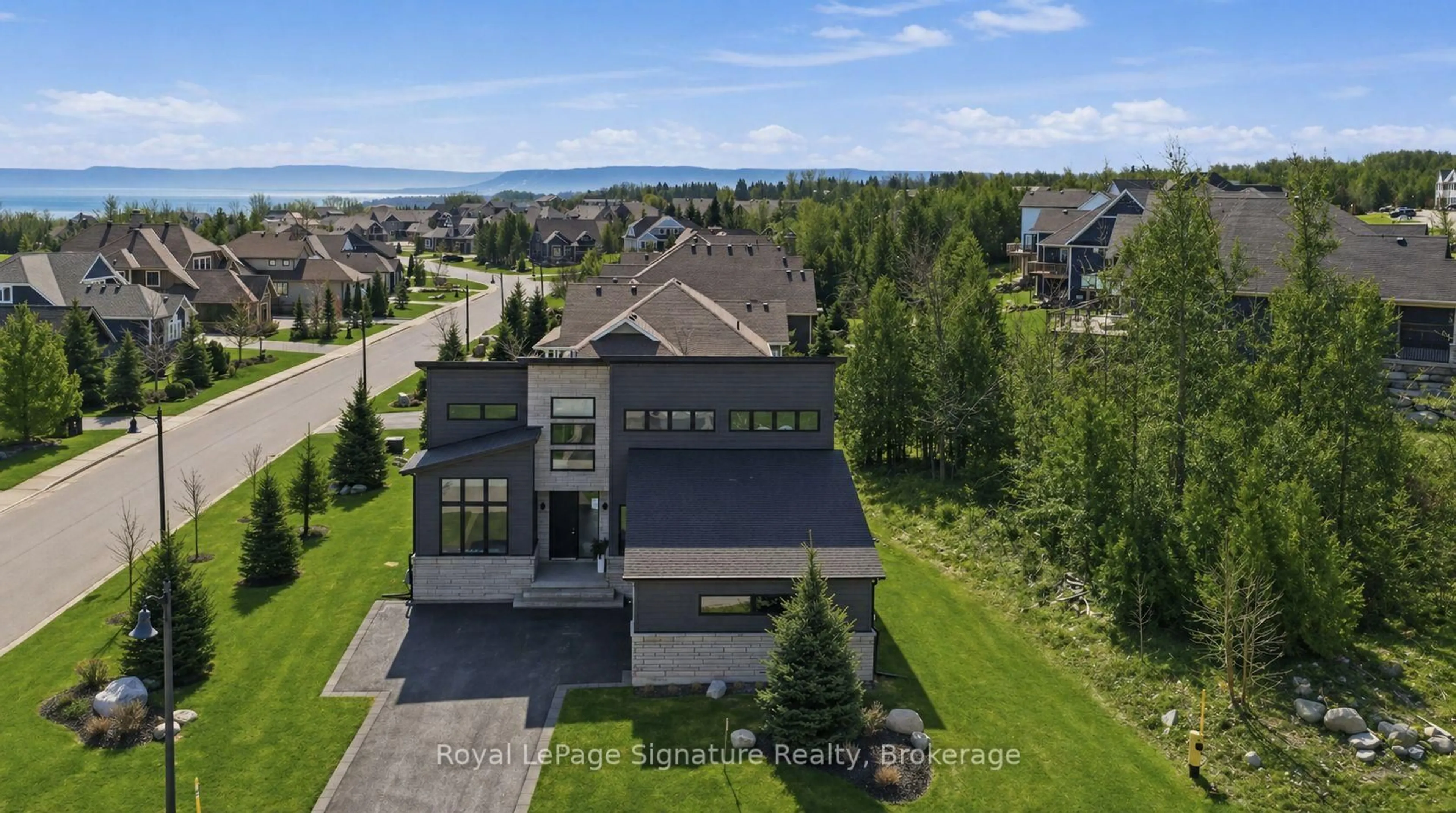 A pic from outside/outdoor area/front of a property/back of a property/a pic from drone, mountain view for 149 Landry Lane, Blue Mountains Ontario N0H 2P0