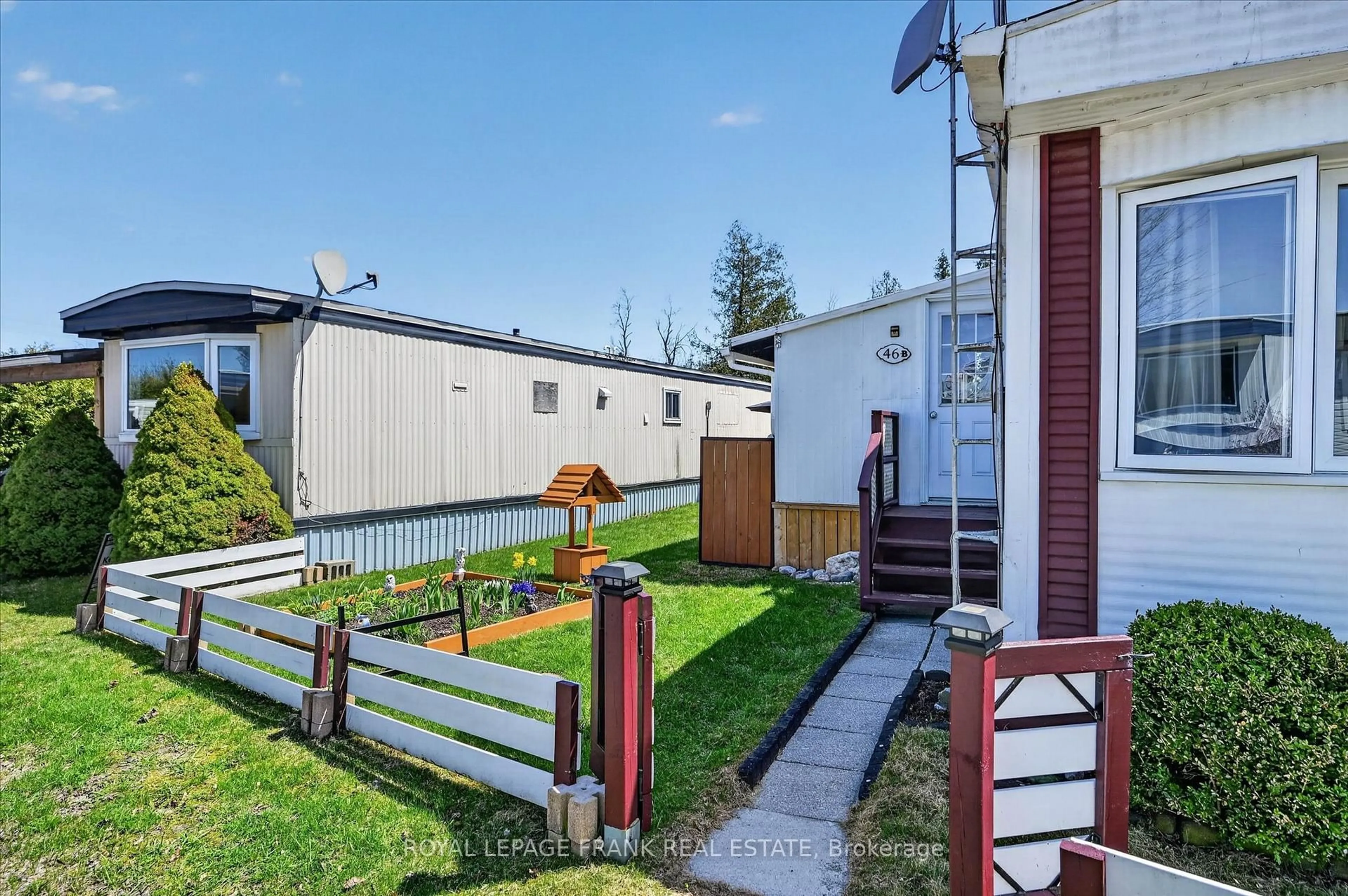 A pic from outside/outdoor area/front of a property/back of a property/a pic from drone, street for 2244 Heritage Line #46B, Otonabee-South Monaghan Ontario K9J 6X8