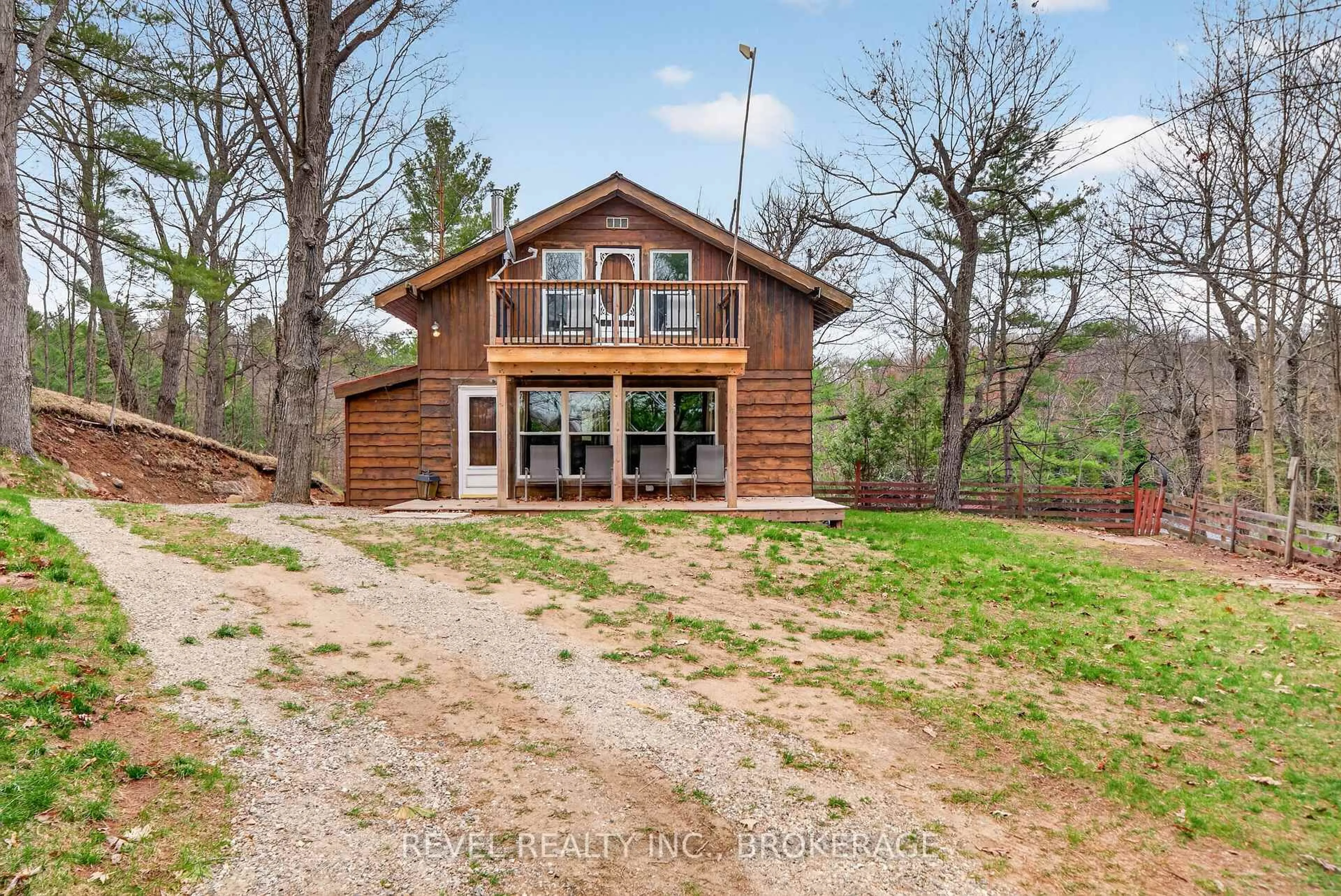 A pic from outside/outdoor area/front of a property/back of a property/a pic from drone, water/lake/river/ocean view for 341 Tim's Lane, Godfrey Ontario K0H 1T0