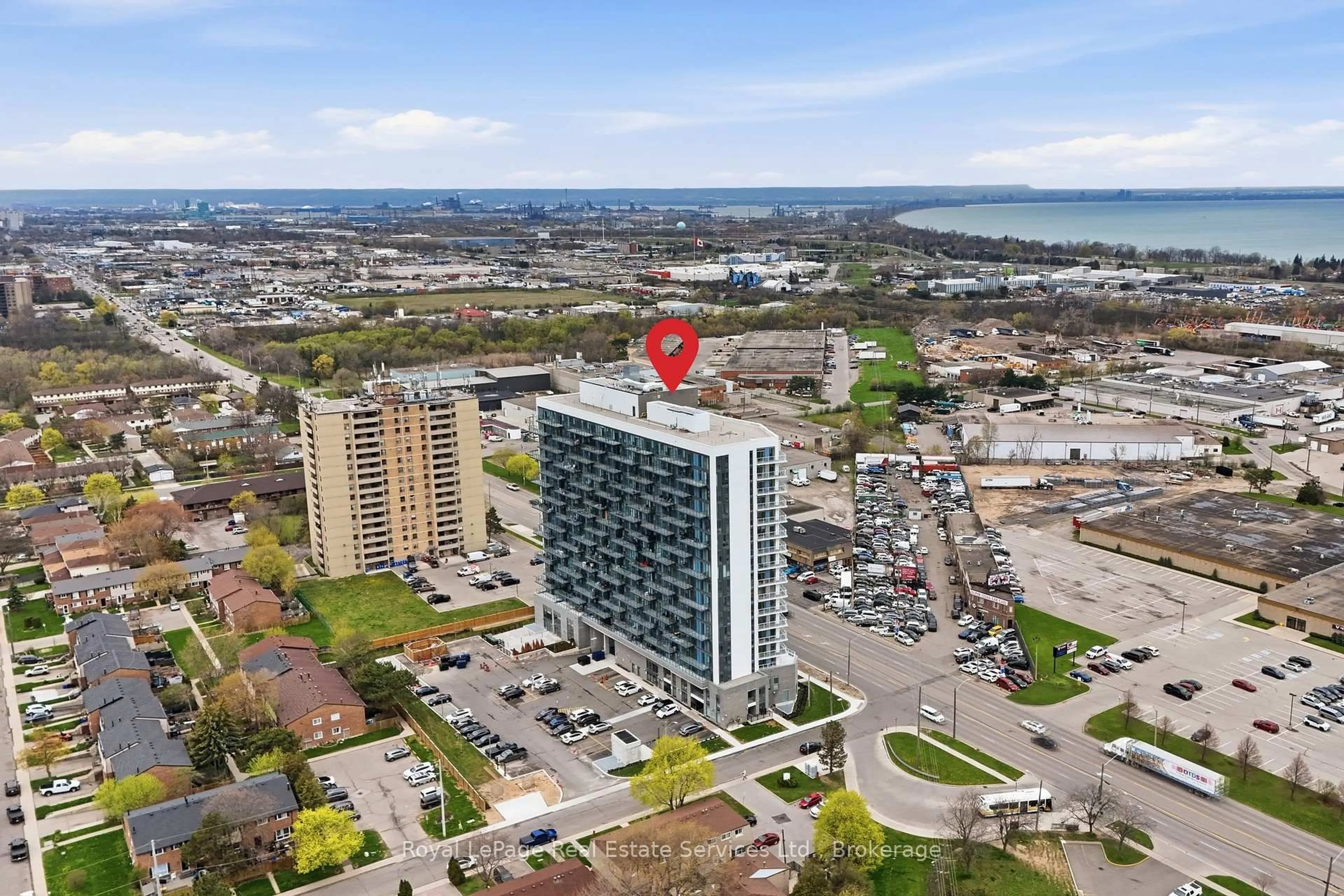A pic from outside/outdoor area/front of a property/back of a property/a pic from drone, unknown for 2782 Barton St #202, Hamilton Ontario L8E 2J8