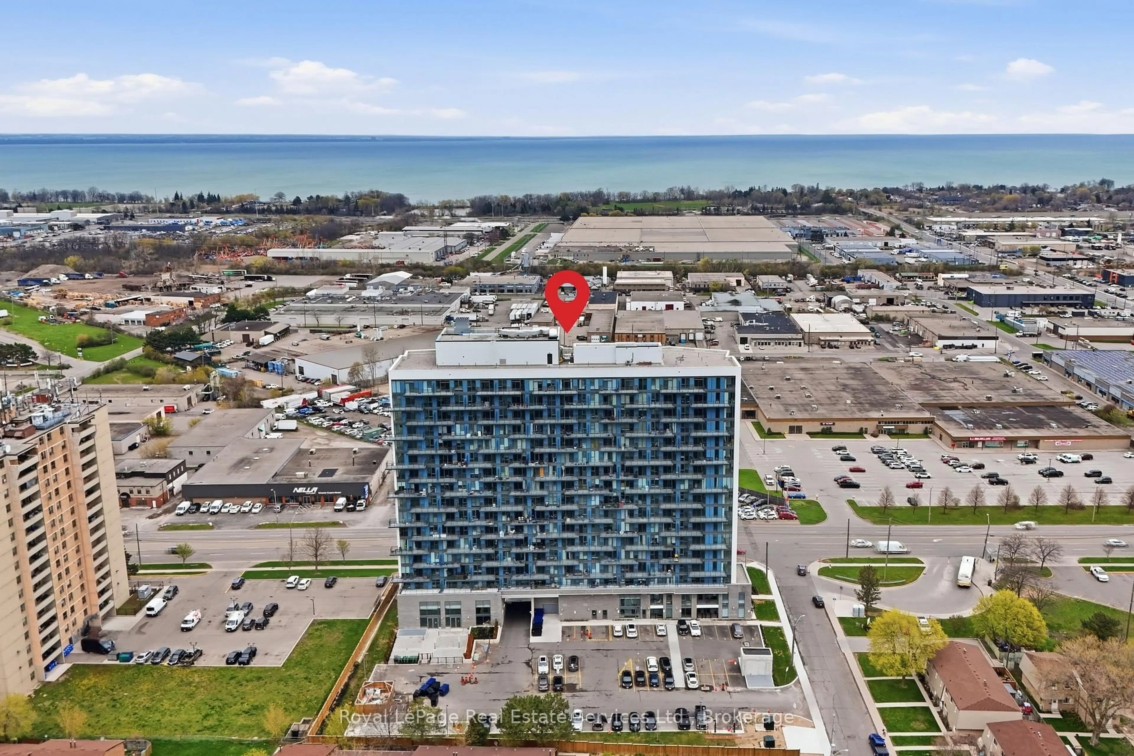 A pic from outside/outdoor area/front of a property/back of a property/a pic from drone, unknown for 2782 Barton St #202, Hamilton Ontario L8E 2J8