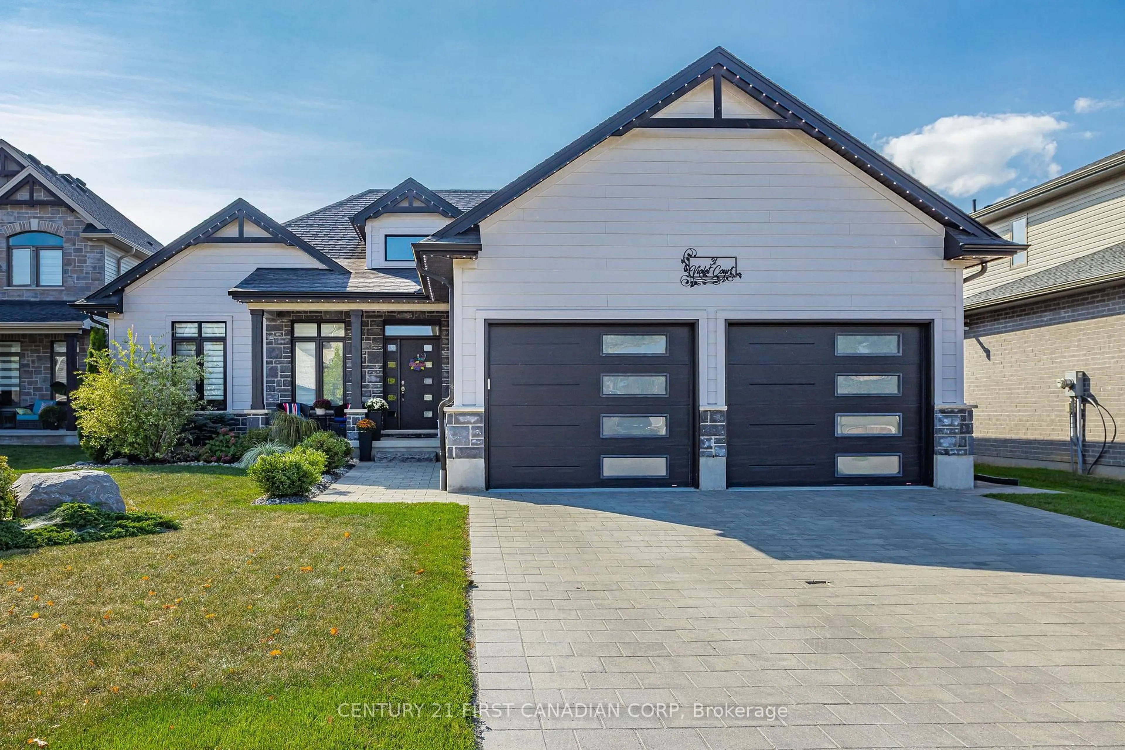 Home with vinyl exterior material, street for 31 Violet Crt, Middlesex Centre Ontario N0M 2A0