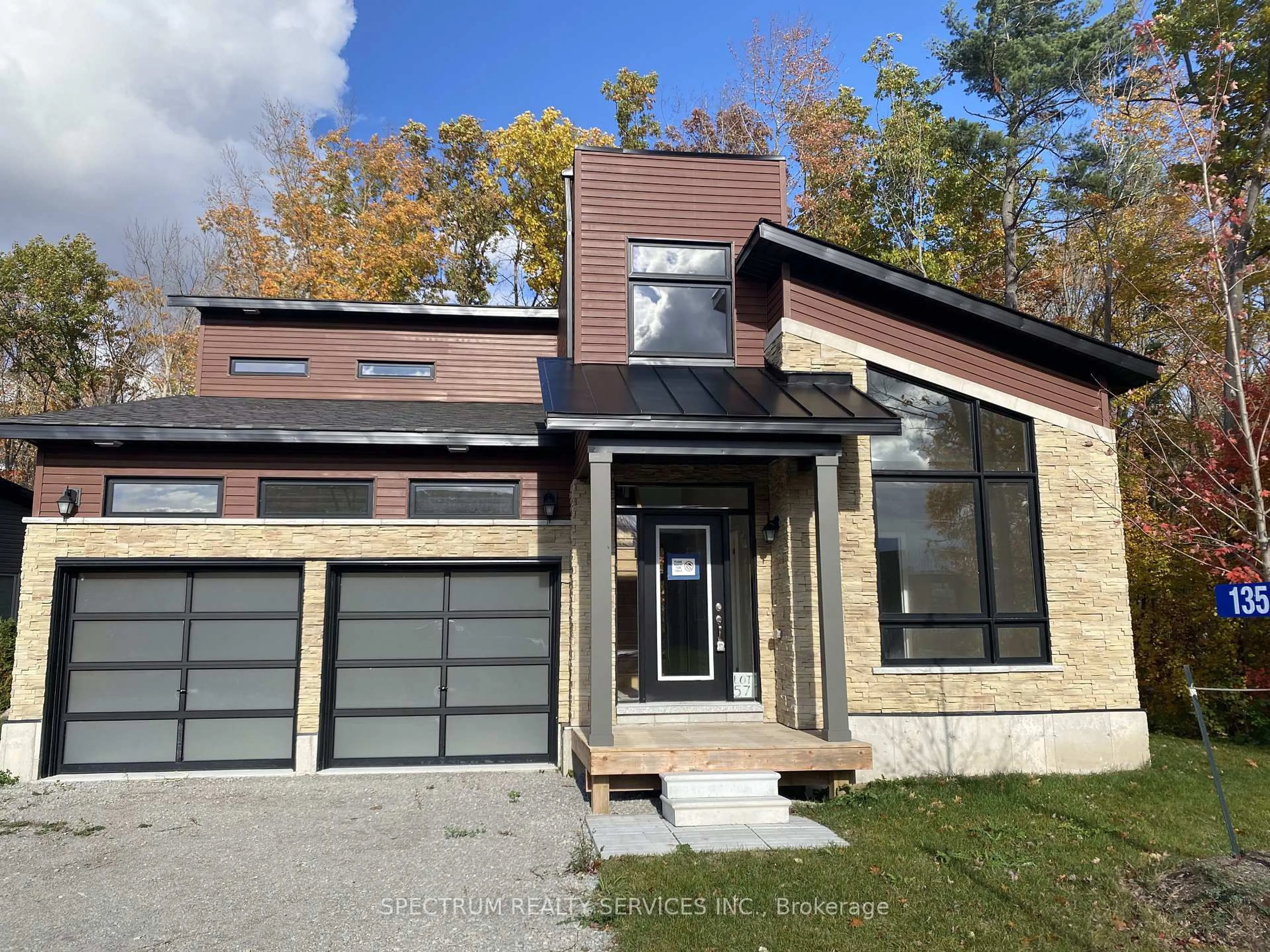 Home with brick exterior material, street for 135 Marina Village Dr, Georgian Bay Ontario L0K 1S0