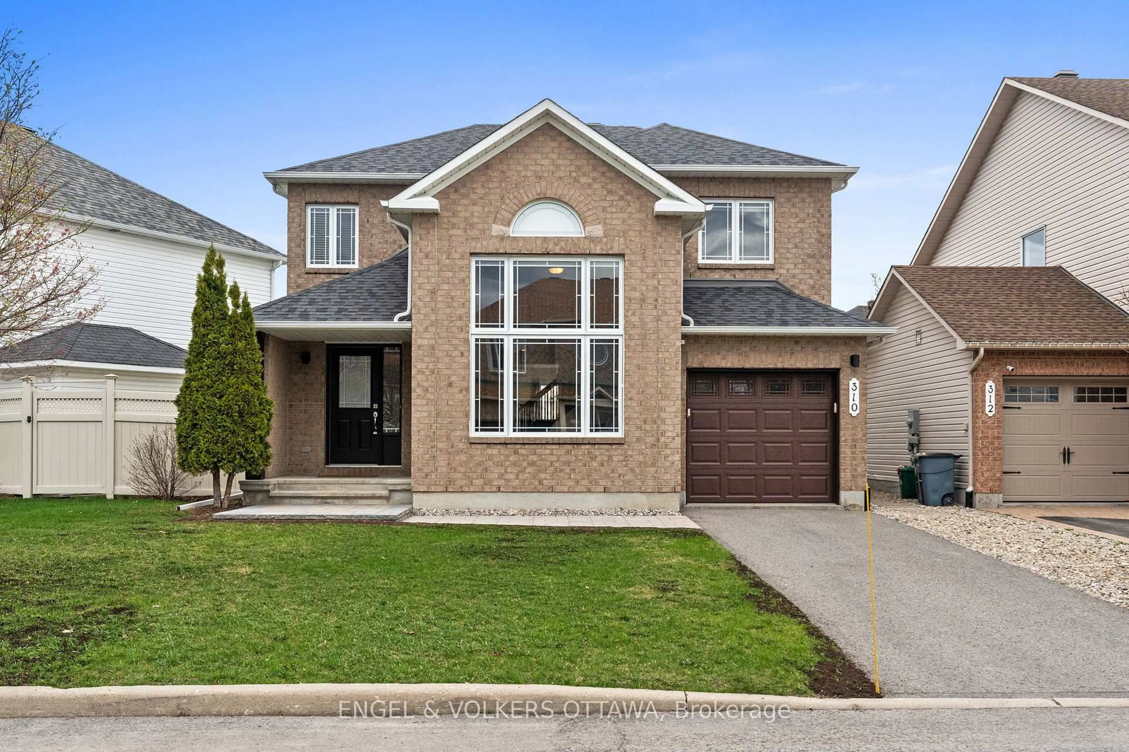 Home with brick exterior material, street for 310 Sarabella St, Ottawa Ontario K4A 0A3