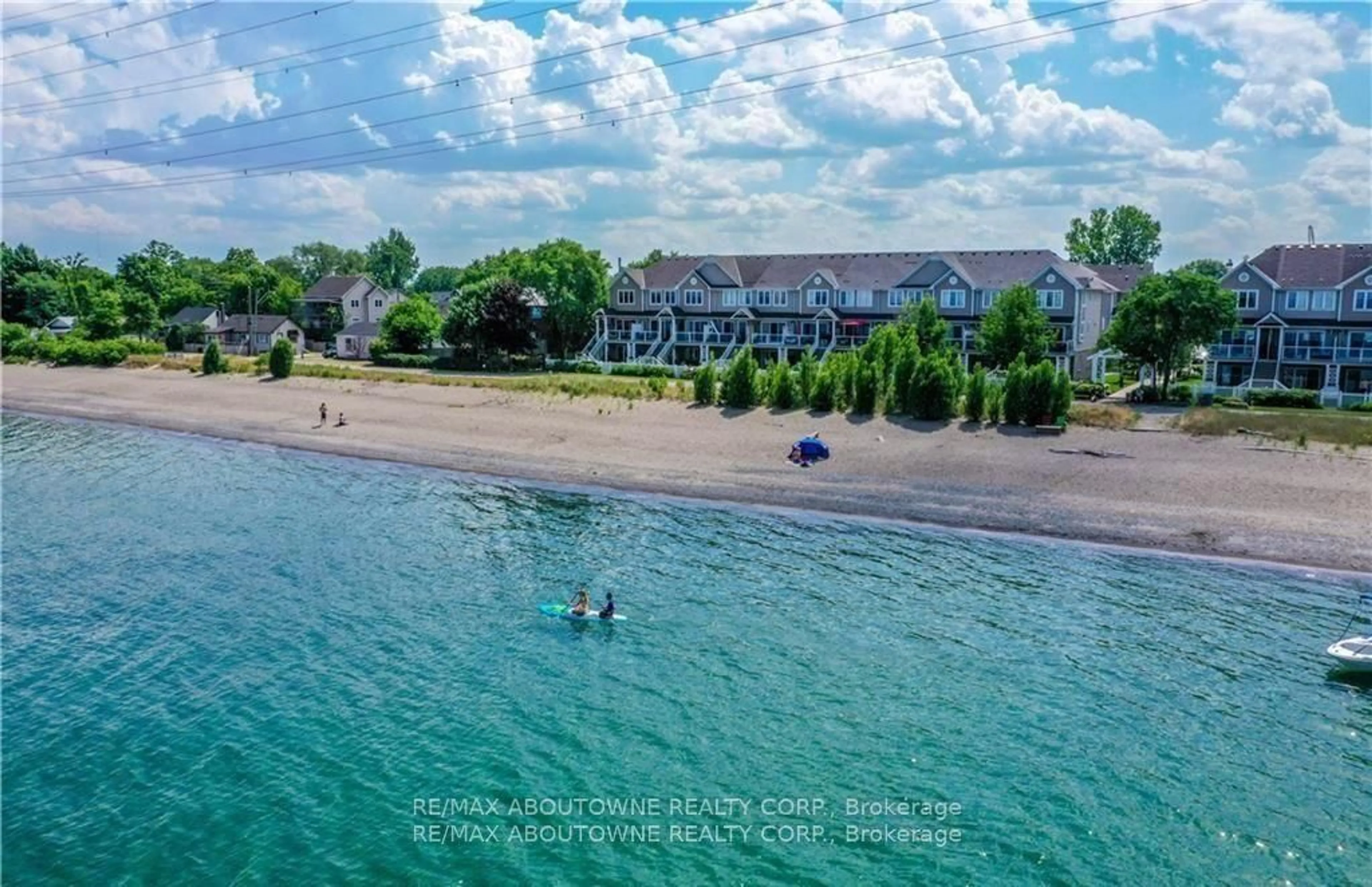 A pic from outside/outdoor area/front of a property/back of a property/a pic from drone, water/lake/river/ocean view for 337 Beach Blvd ##3, Hamilton Ontario L8H 6W4