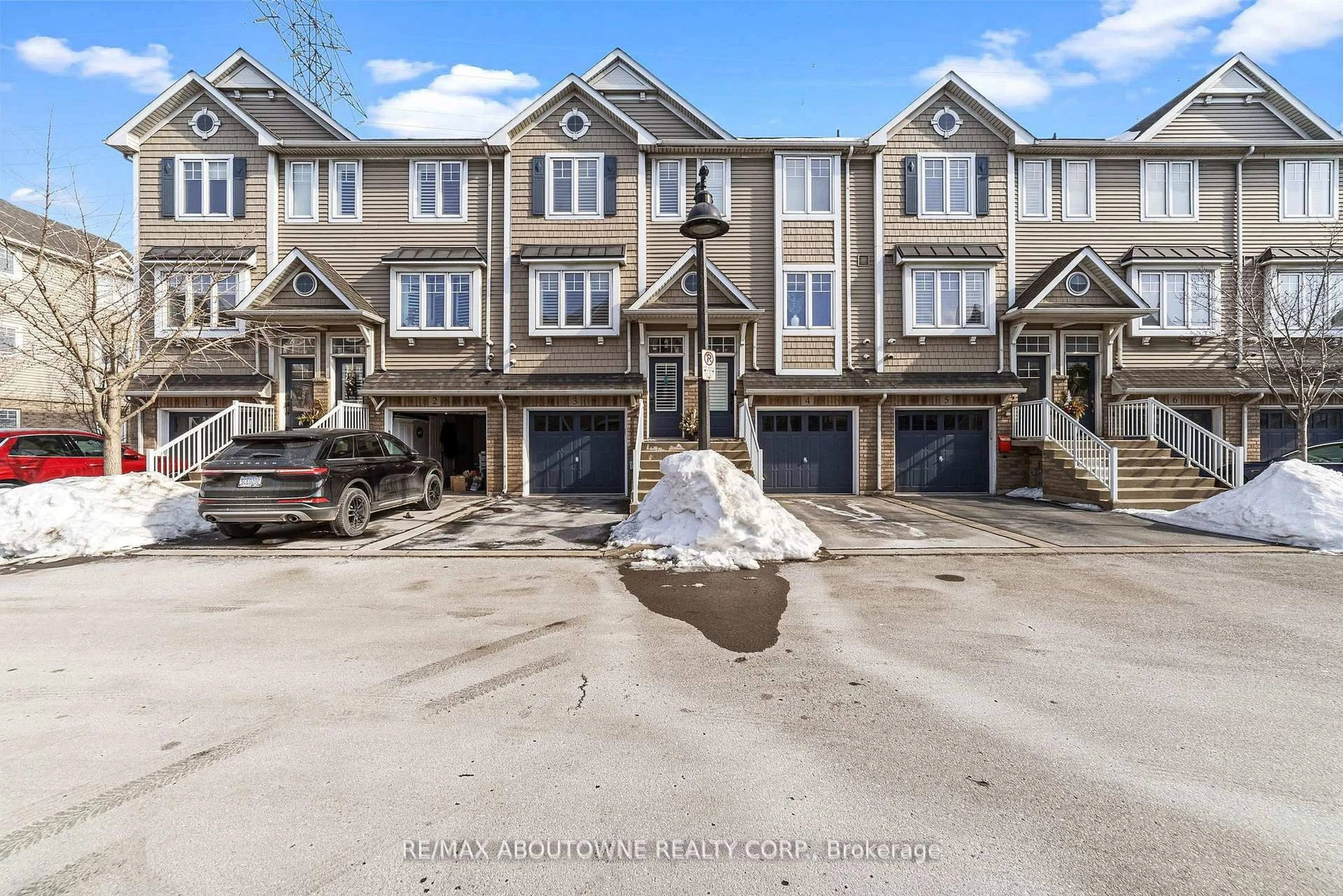 A pic from outside/outdoor area/front of a property/back of a property/a pic from drone, street for 337 Beach Blvd ##3, Hamilton Ontario L8H 6W4