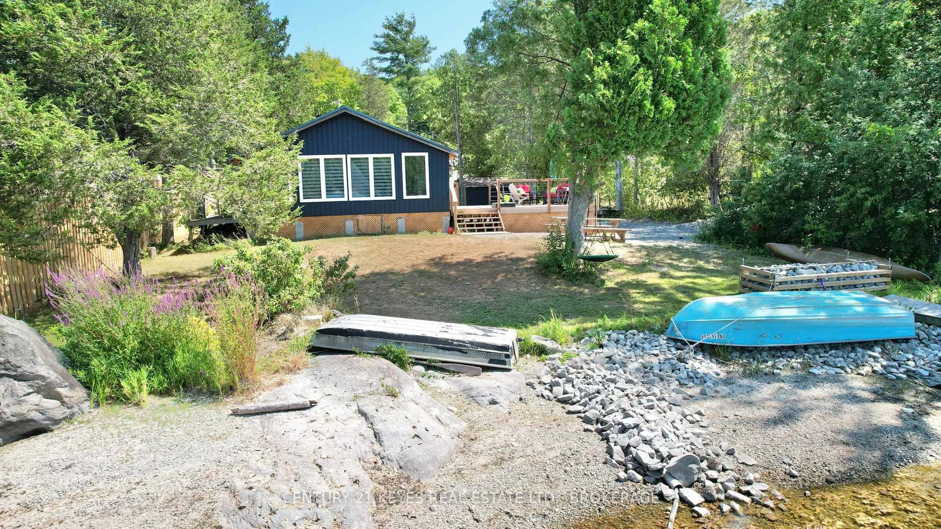 A pic from outside/outdoor area/front of a property/back of a property/a pic from drone, water/lake/river/ocean view for 910 Hummingbird Lane, Leeds and the Thousand Islands Ontario K0E 1L0
