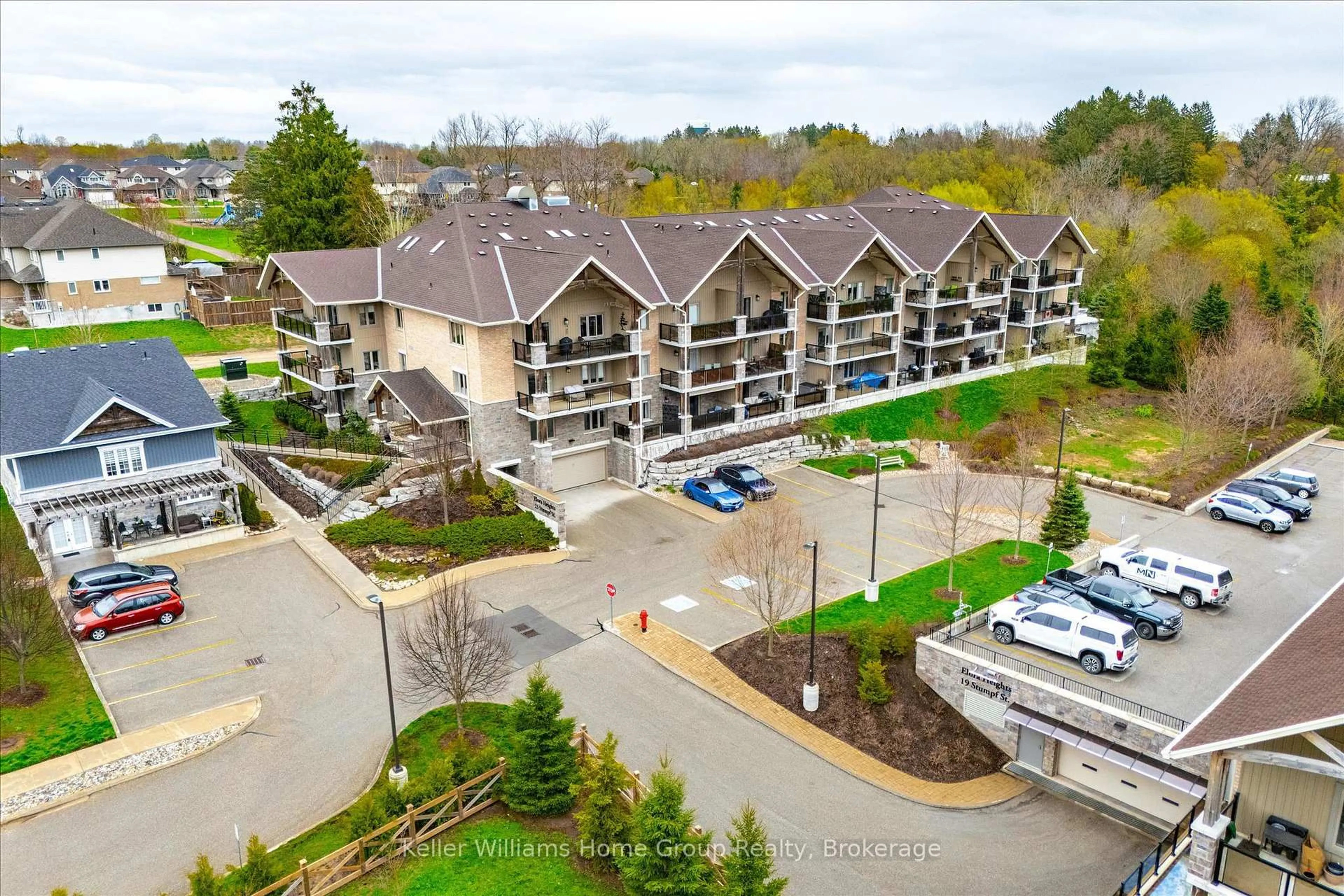 A pic from outside/outdoor area/front of a property/back of a property/a pic from drone, water/lake/river/ocean view for 23 Stumpf St #102, Centre Wellington Ontario N0B 1S0