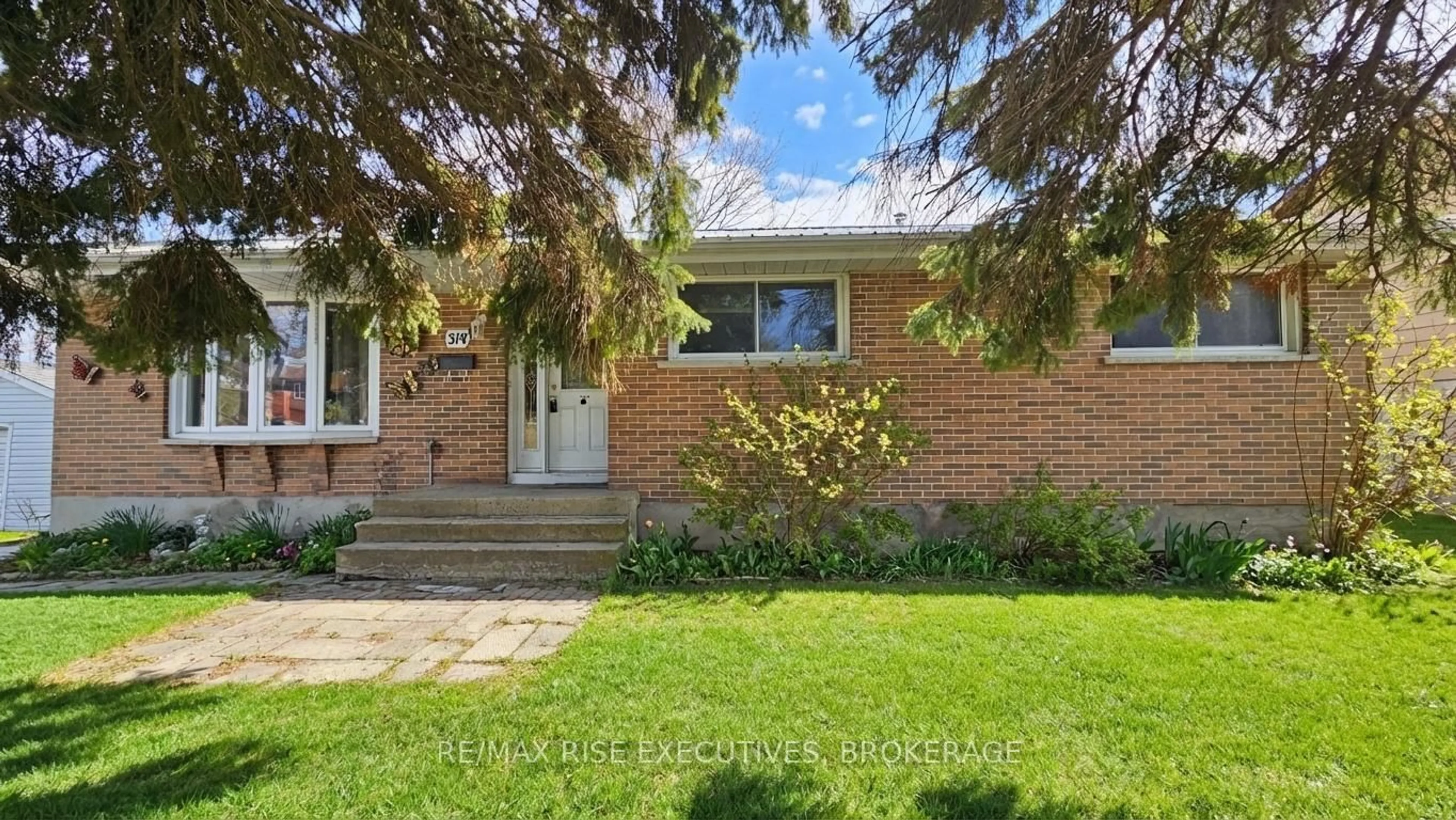 Home with brick exterior material, street for 314 Amherst Dr, Loyalist Ontario K7N 1S9