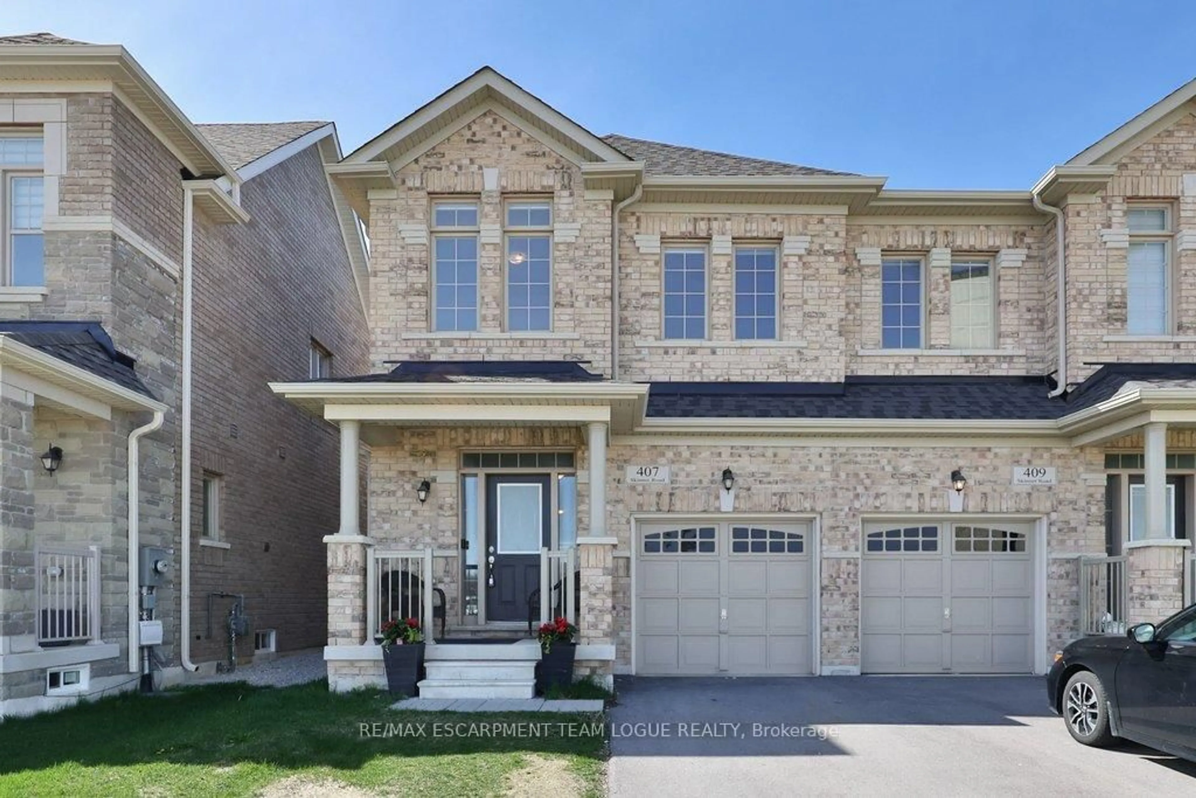 Home with brick exterior material, street for 407 SKINNER Rd, Hamilton Ontario L8B 1Z7