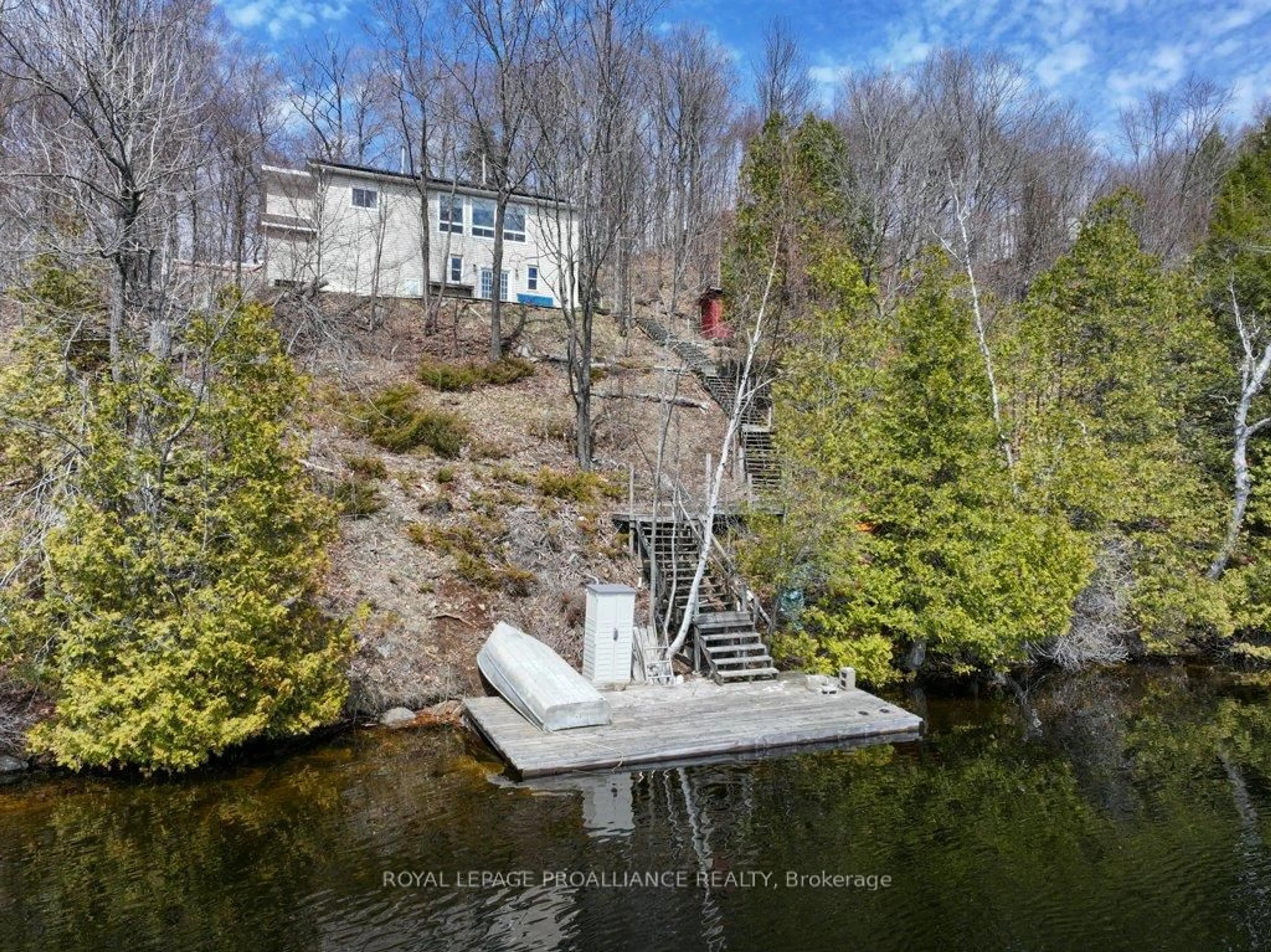 A pic from outside/outdoor area/front of a property/back of a property/a pic from drone, water/lake/river/ocean view for 1076 Valley Lane, Sharbot Lake Ontario K0H 2P0