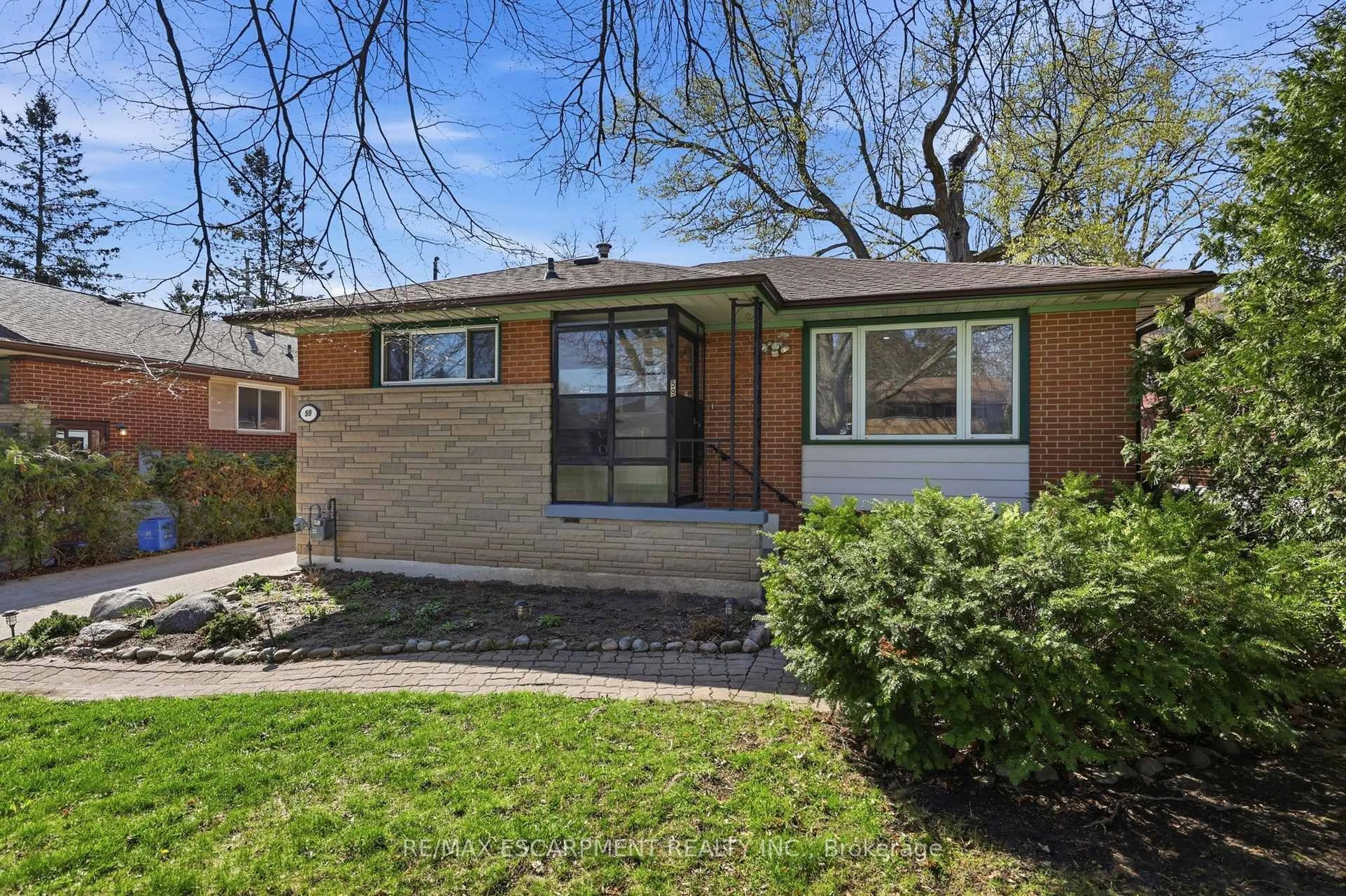 Home with brick exterior material, street for 59 Purvis Dr, Hamilton Ontario L8S 2S5