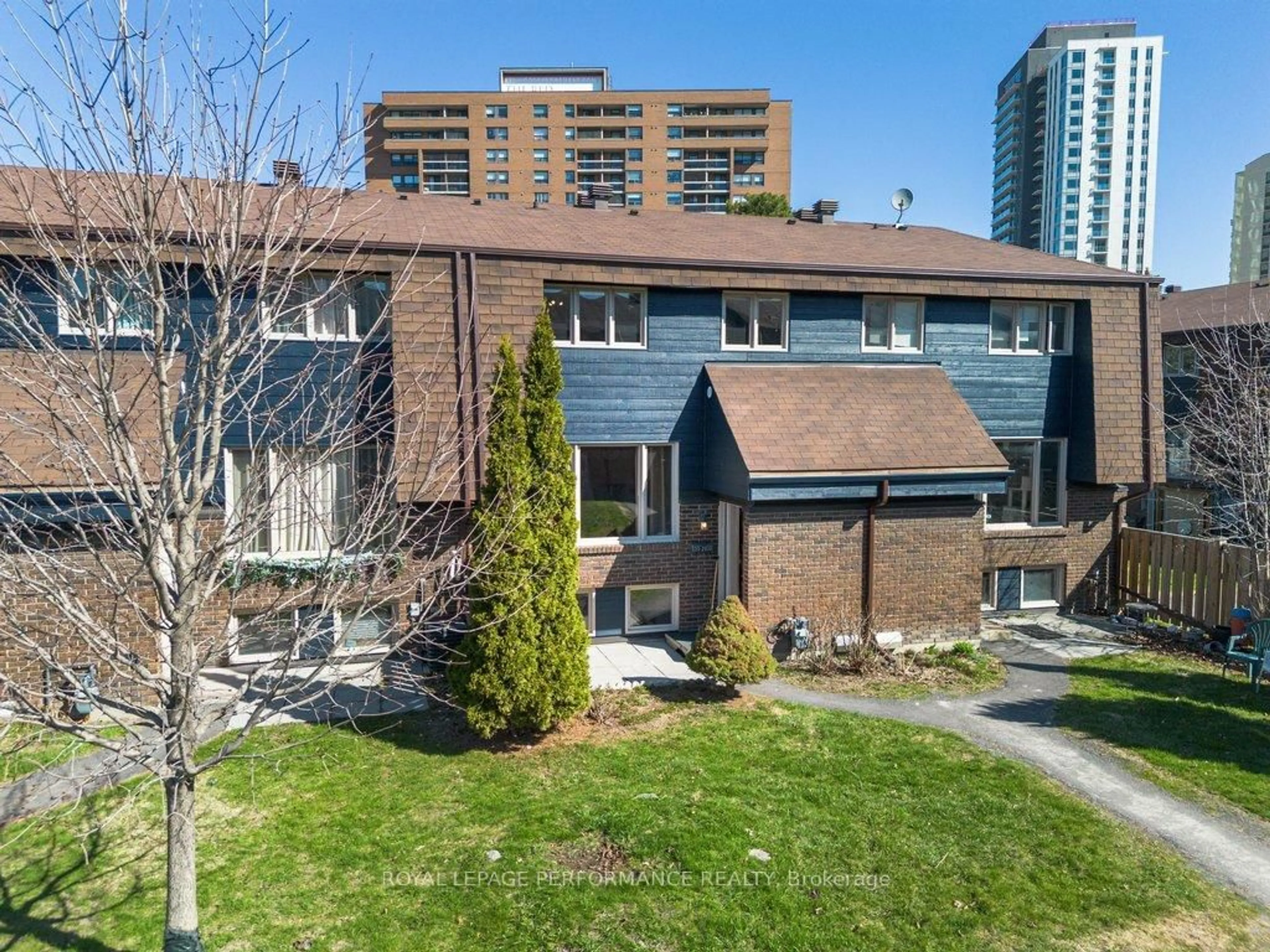 A pic from outside/outdoor area/front of a property/back of a property/a pic from drone, unknown for 2610 Draper Ave #55, Ottawa Ontario K2H 8X8