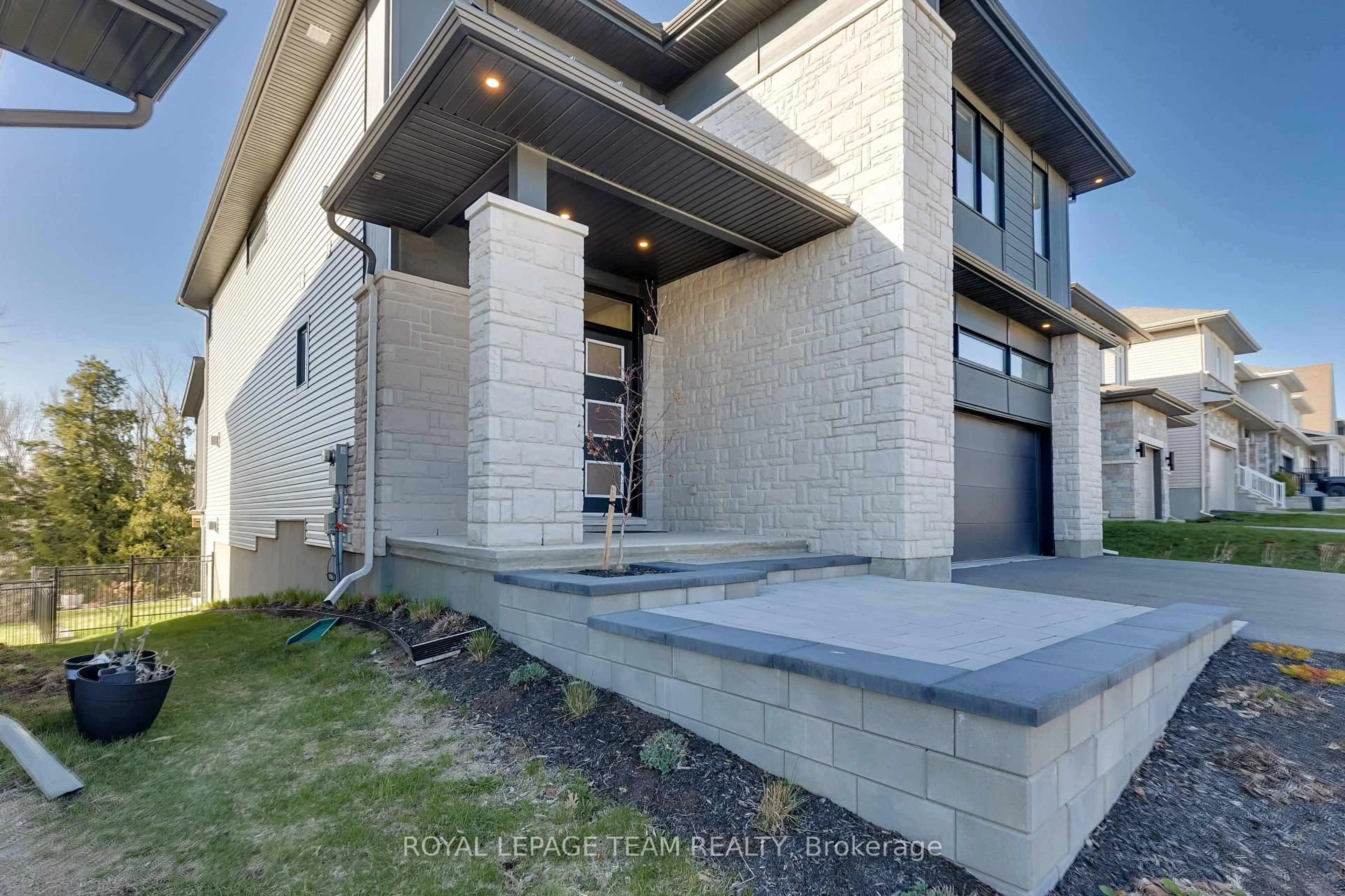 Home with brick exterior material, street for 136 Escarpment Cres, Ottawa Ontario K2T 0L8