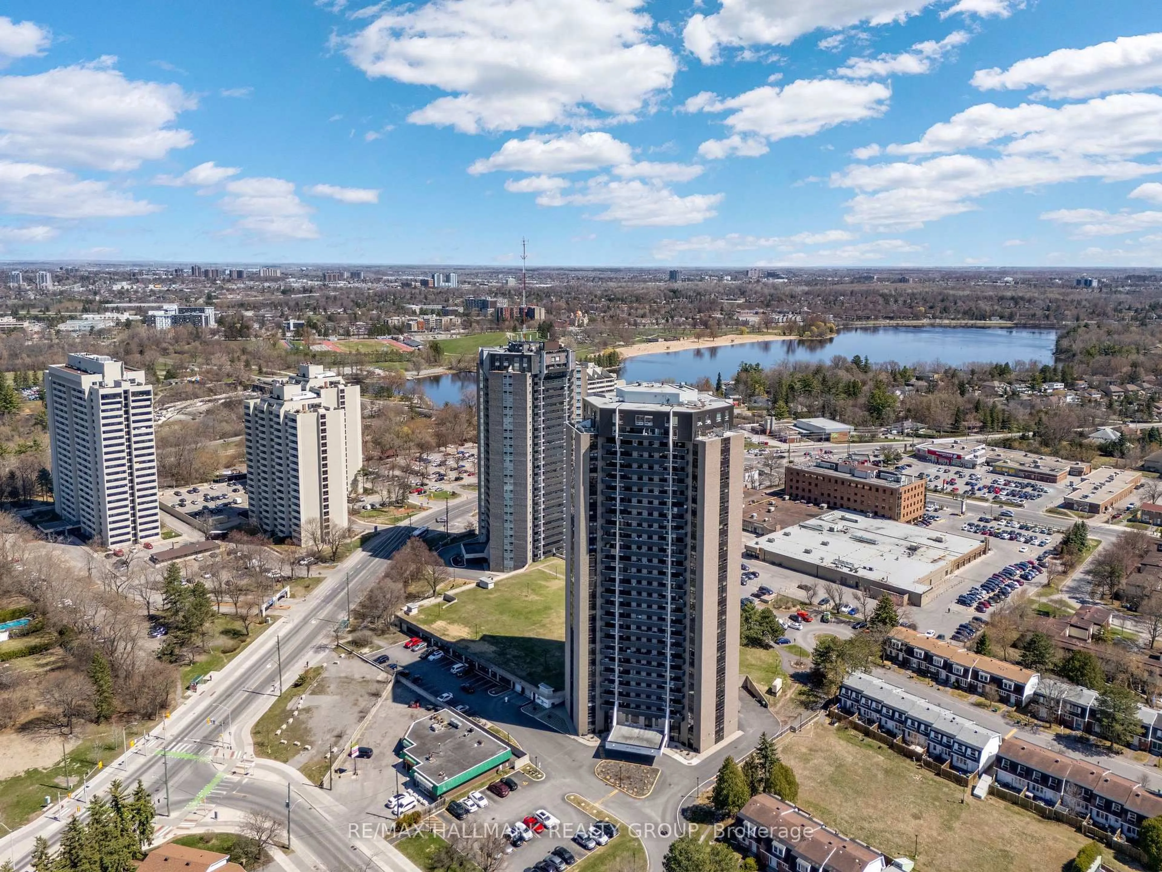 A pic from outside/outdoor area/front of a property/back of a property/a pic from drone, water/lake/river/ocean view for 900 Dynes Rd #407, Ottawa Ontario K2C 3L6