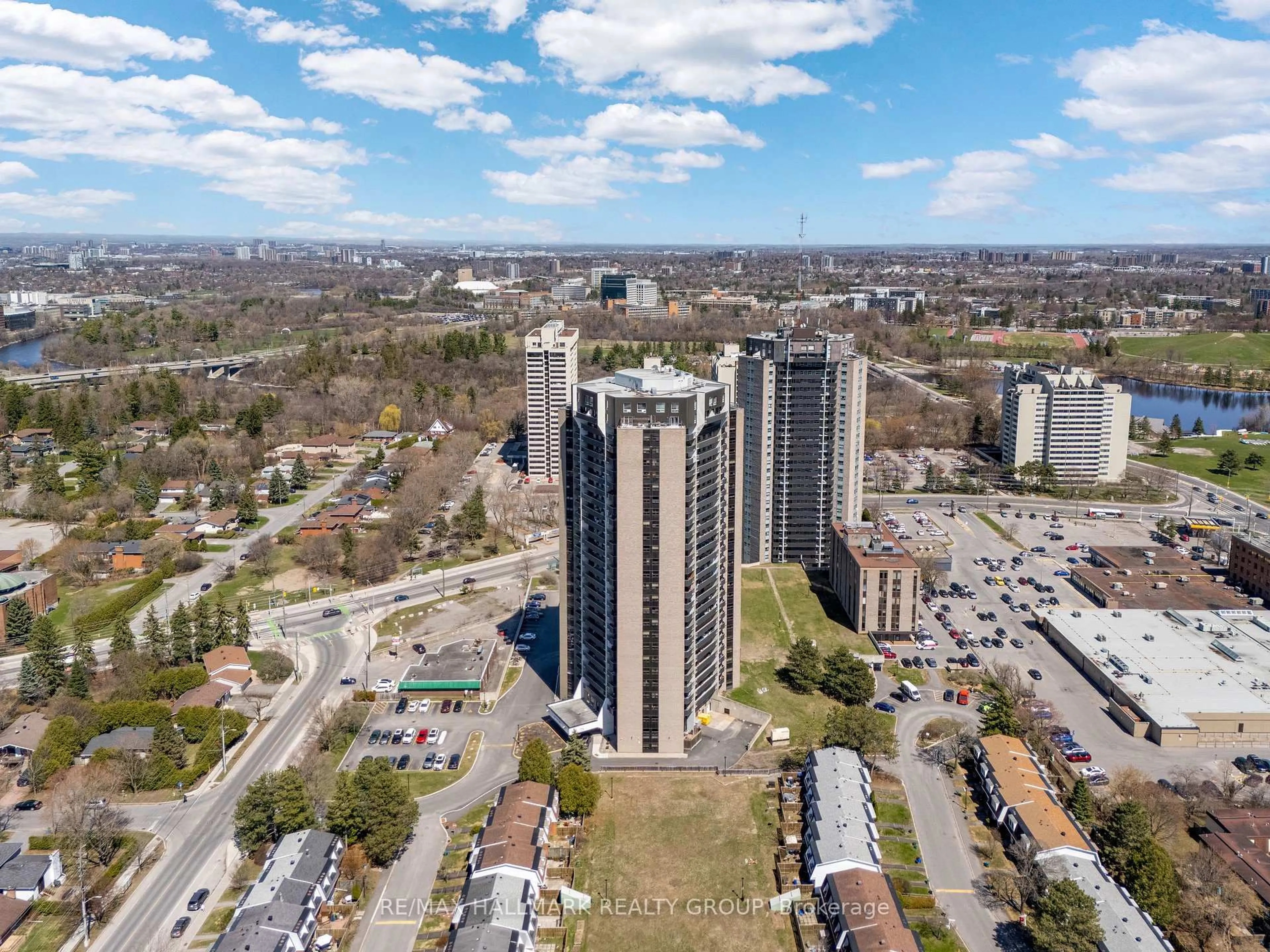 A pic from outside/outdoor area/front of a property/back of a property/a pic from drone, city buildings view from balcony for 900 Dynes Rd #407, Ottawa Ontario K2C 3L6
