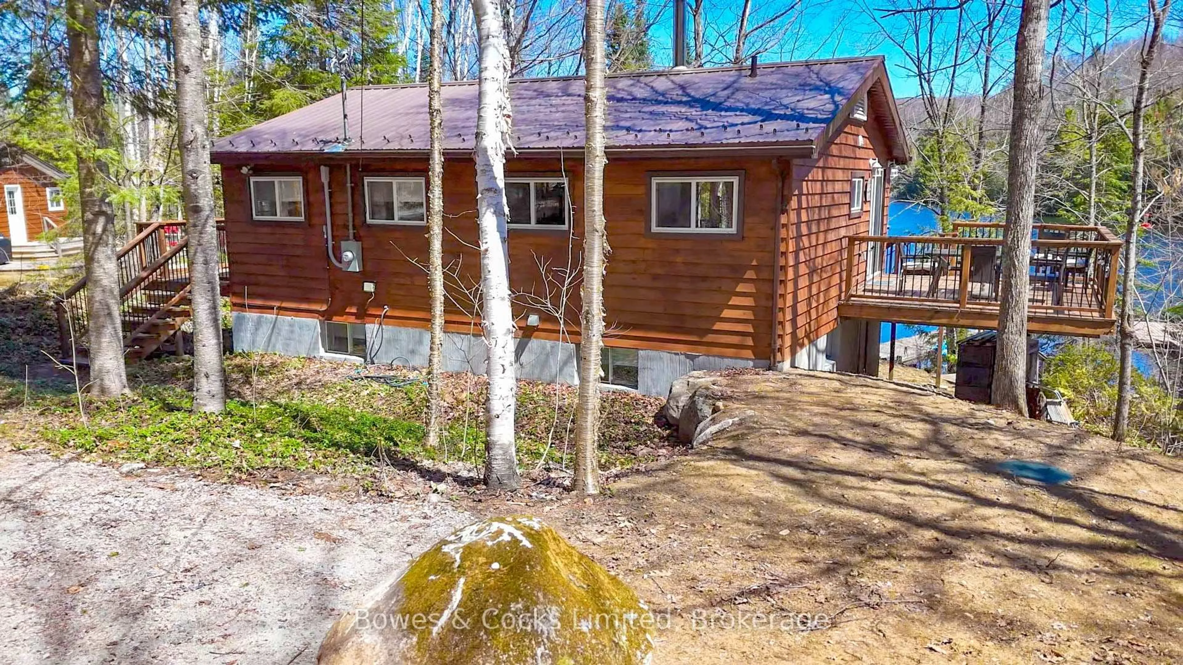 A pic from outside/outdoor area/front of a property/back of a property/a pic from drone, water/lake/river/ocean view for 1063 Esson Creek Lane, Highlands East Ontario K0L 2Y0