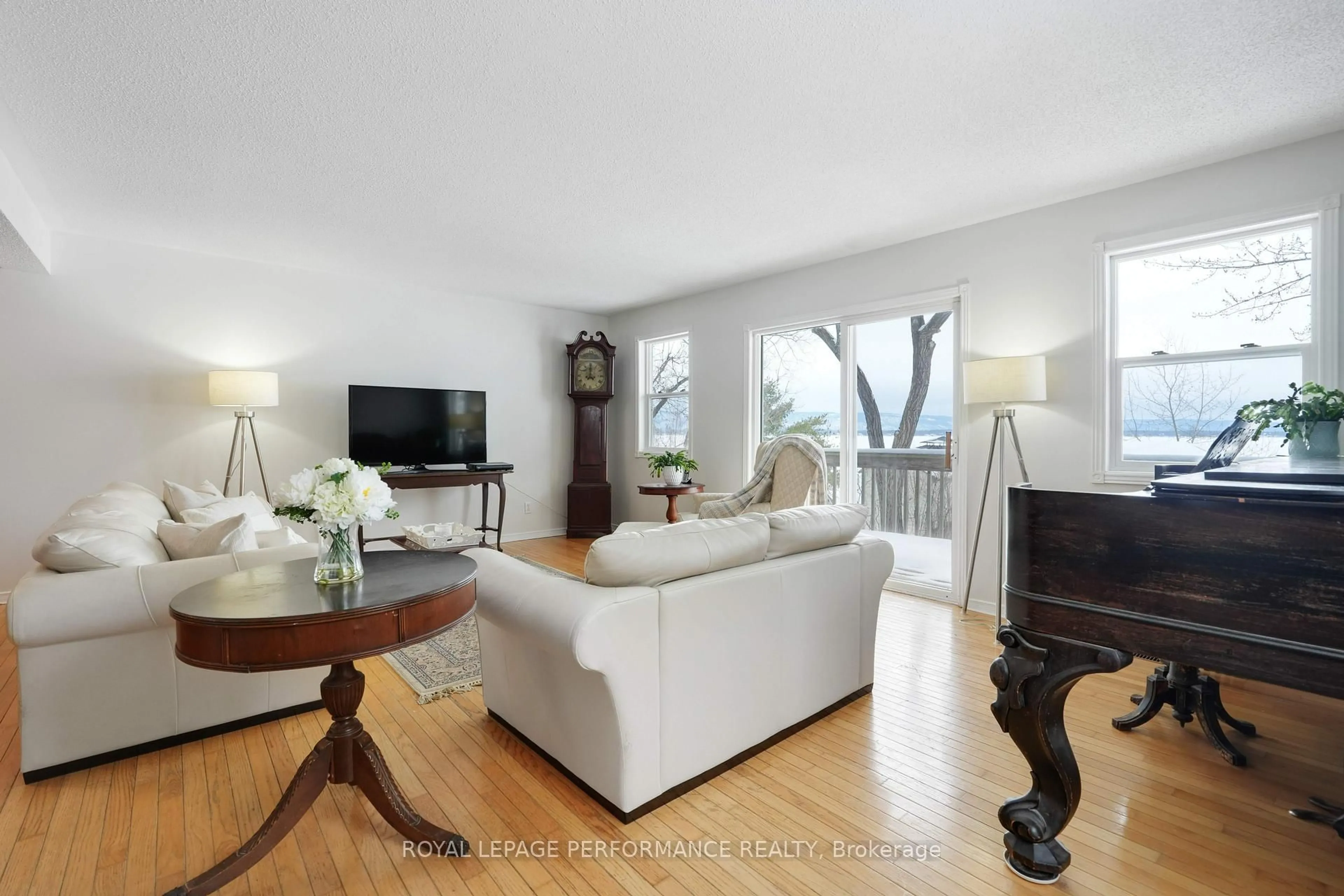 Living room with furniture, wood/laminate floor for 326 Bayview Dr, Ottawa Ontario K0A 3M0