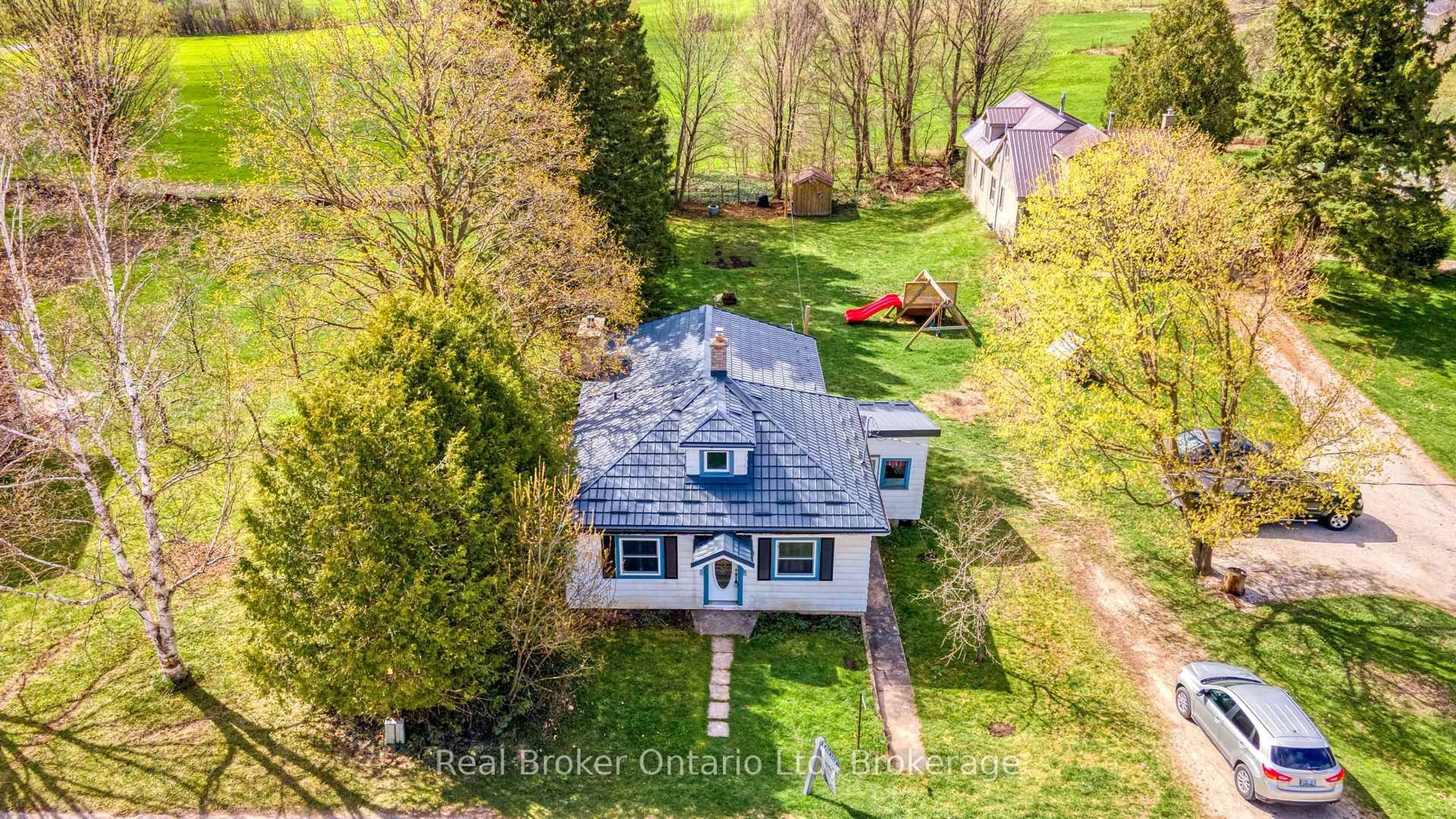 A pic from outside/outdoor area/front of a property/back of a property/a pic from drone, unknown for 102008 Grey 5 Rd, Georgian Bluffs Ontario N4K 5N5