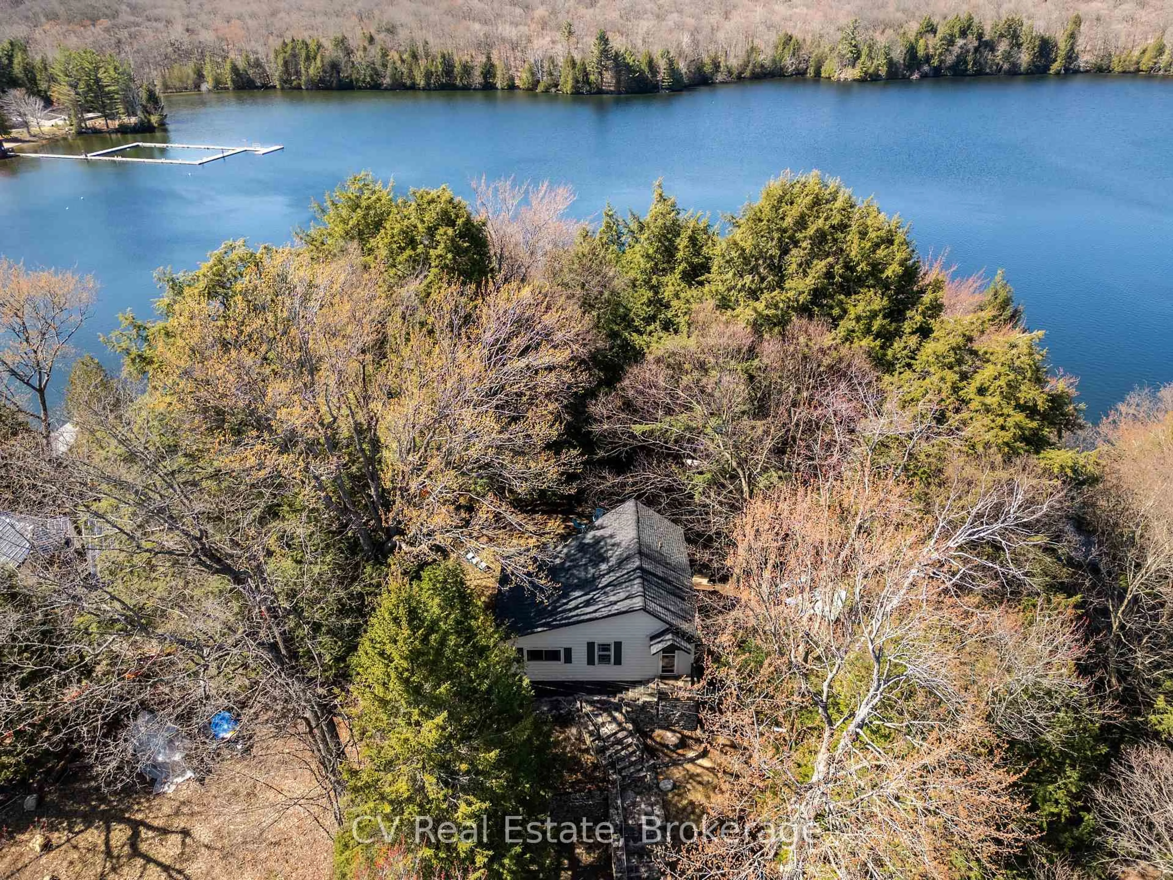 A pic from outside/outdoor area/front of a property/back of a property/a pic from drone, water/lake/river/ocean view for 1117 - Bert Sims Rd #Unit #5, Muskoka Lakes Ontario P0B 1M0